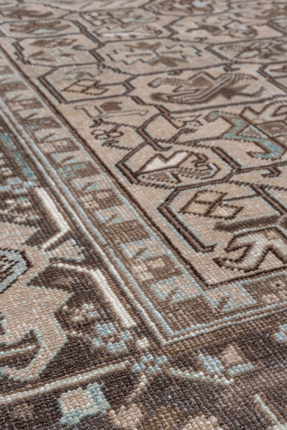 9' x 12' one-of-a-kind handmade antique Heriz large size rug. Color palette: taupe, brown, camel, ivory, pale_blue, beige
