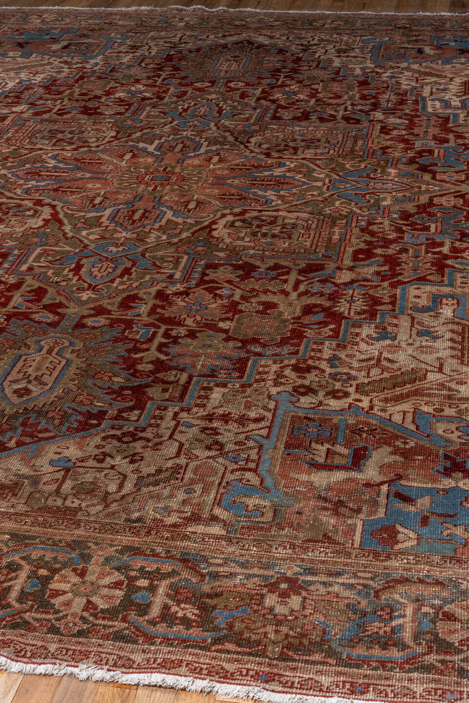 9' x 12' one-of-a-kind handmade antique Heriz large size rug. Color palette: rust, ivory, taupe, sky blue, brown, slate