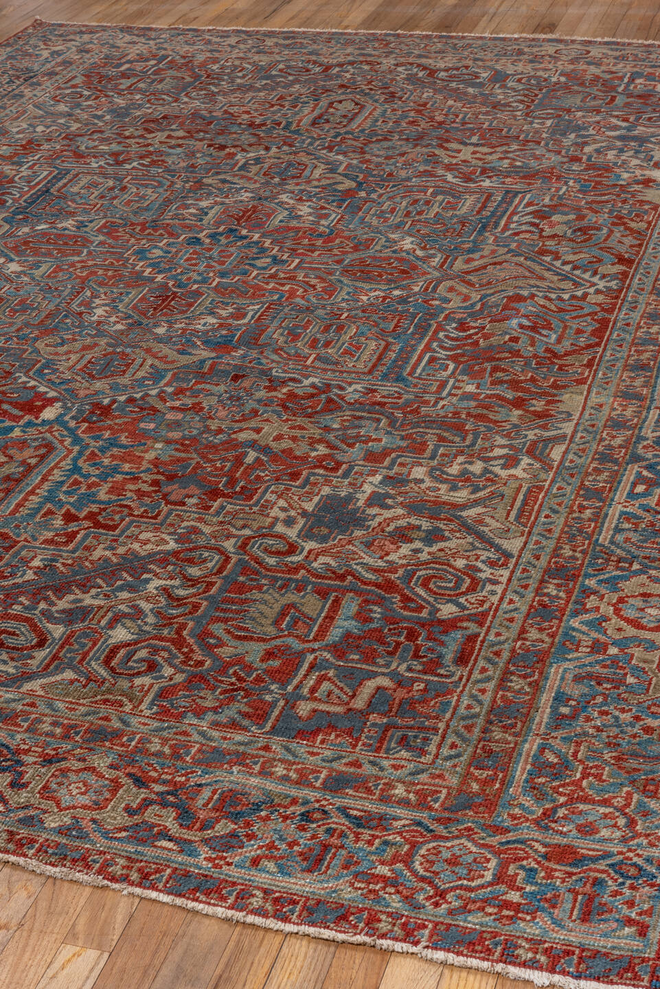 8' x 10' one-of-a-kind handmade antique Heriz large size rug. Color palette: rust, ivory, slate, navy, terra cotta, camel