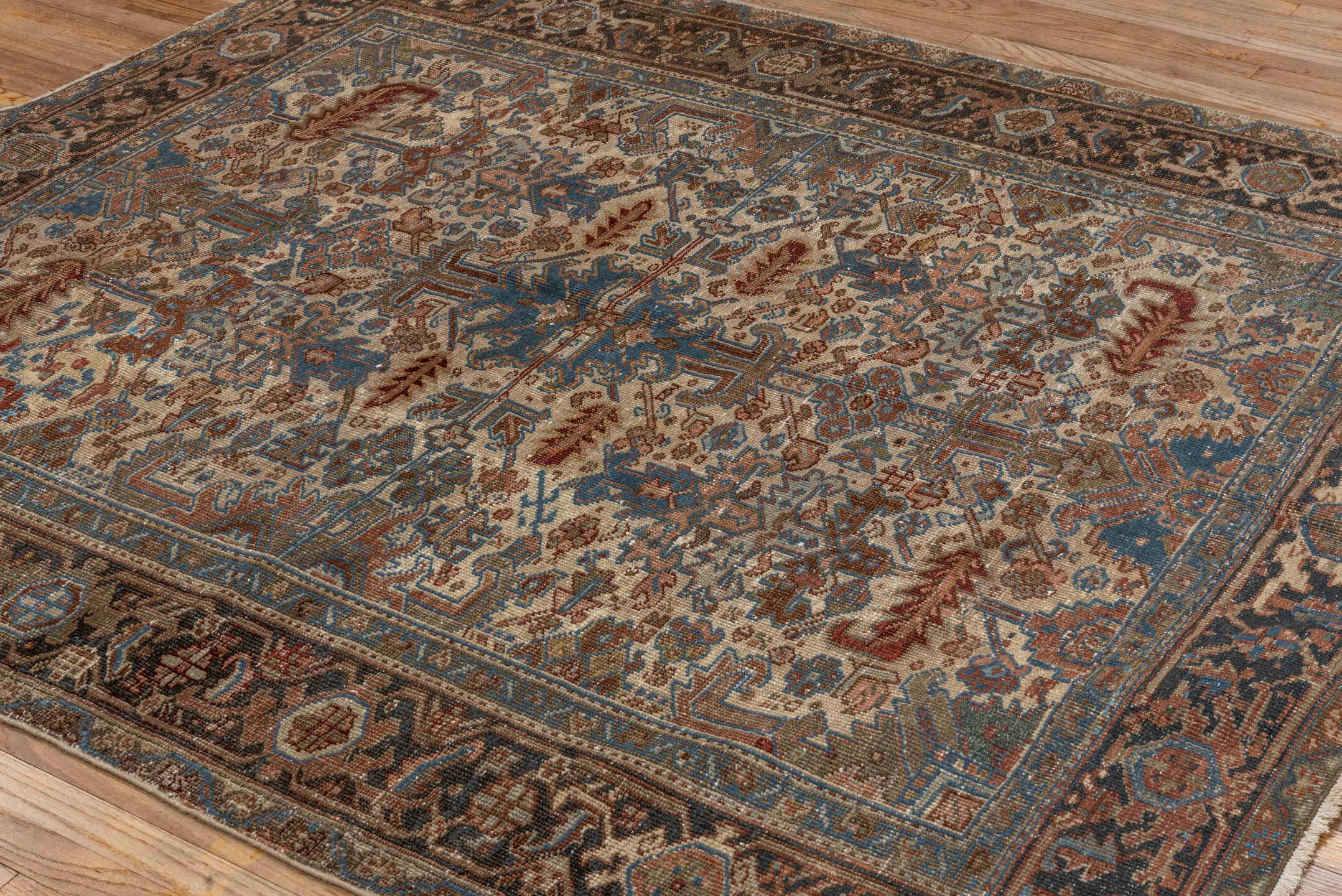 6' x 7' one-of-a-kind handmade vintage Heriz rug. Color palette: black, blue, brown, dark gray, dim gray, gainsboro, gray