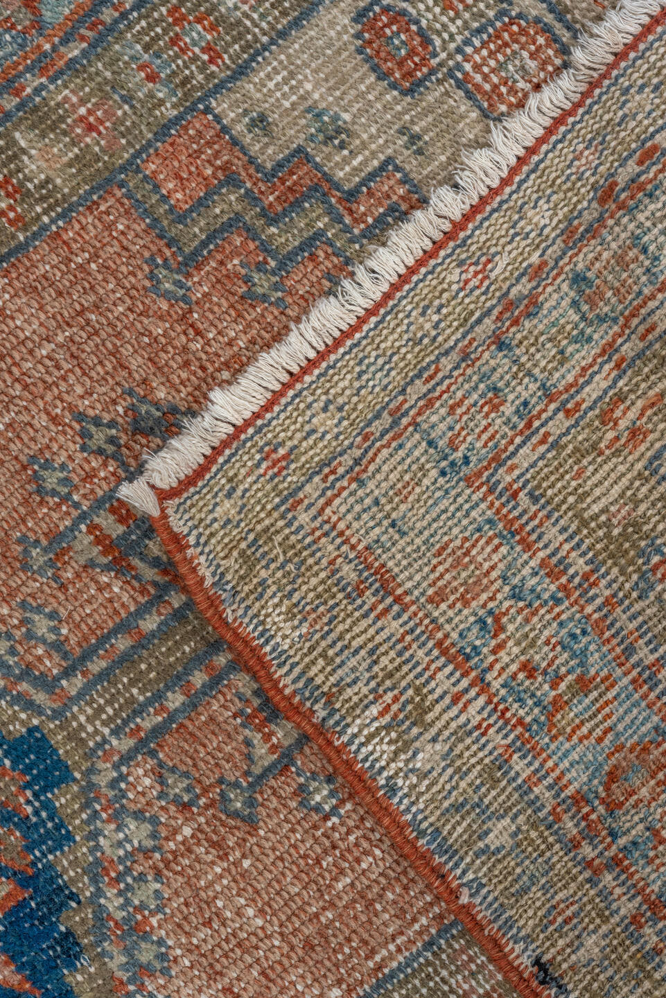 2' x 4' one-of-a-kind handmade antique Heriz small size rug. Color palette: ivory, faded coral, slate blue, indigo, taupe