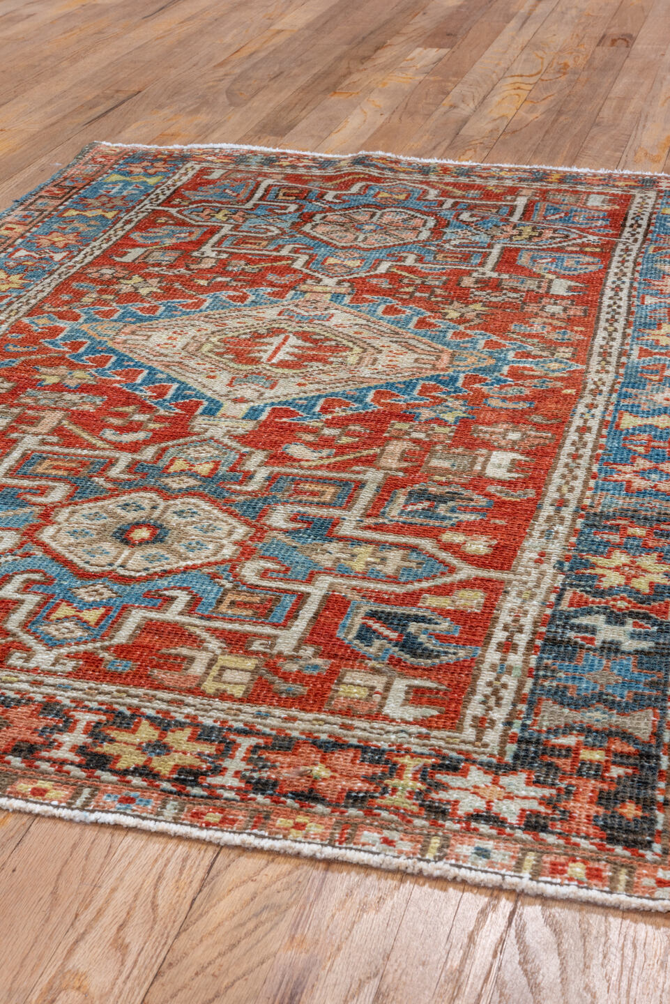 3' x 4' one-of-a-kind handmade vintage Karaje small size rug. Color palette: black, blue, brown, charcoal, gray, light gray