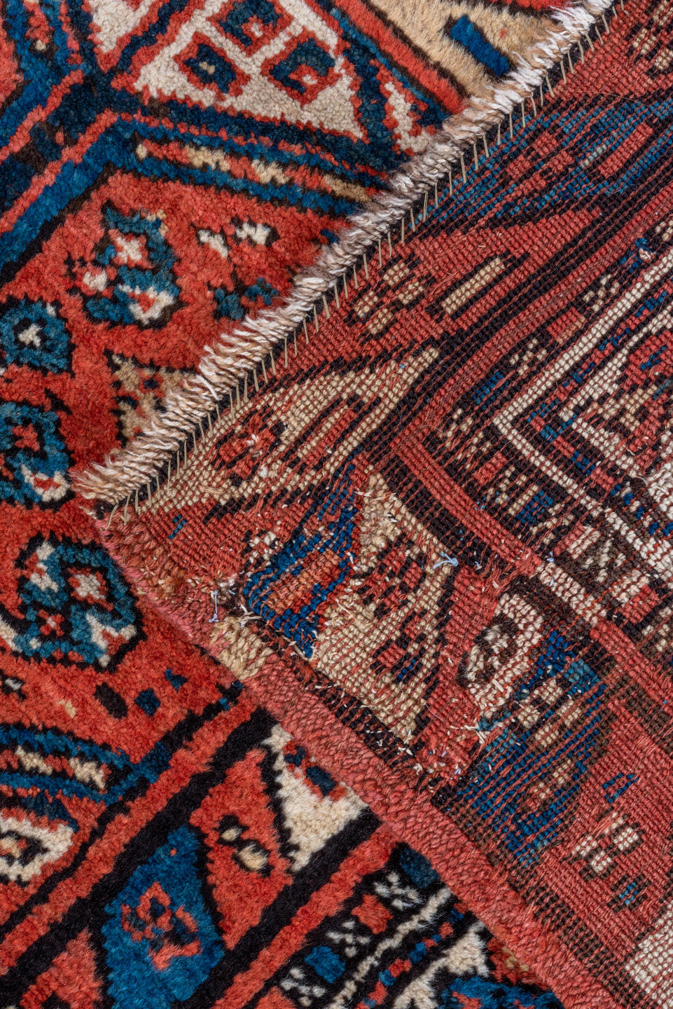 3' x 9' one-of-a-kind handmade antique NW Persian runner rug. Color palette: rust, indigo, ivory, navy, terra cotta, camel