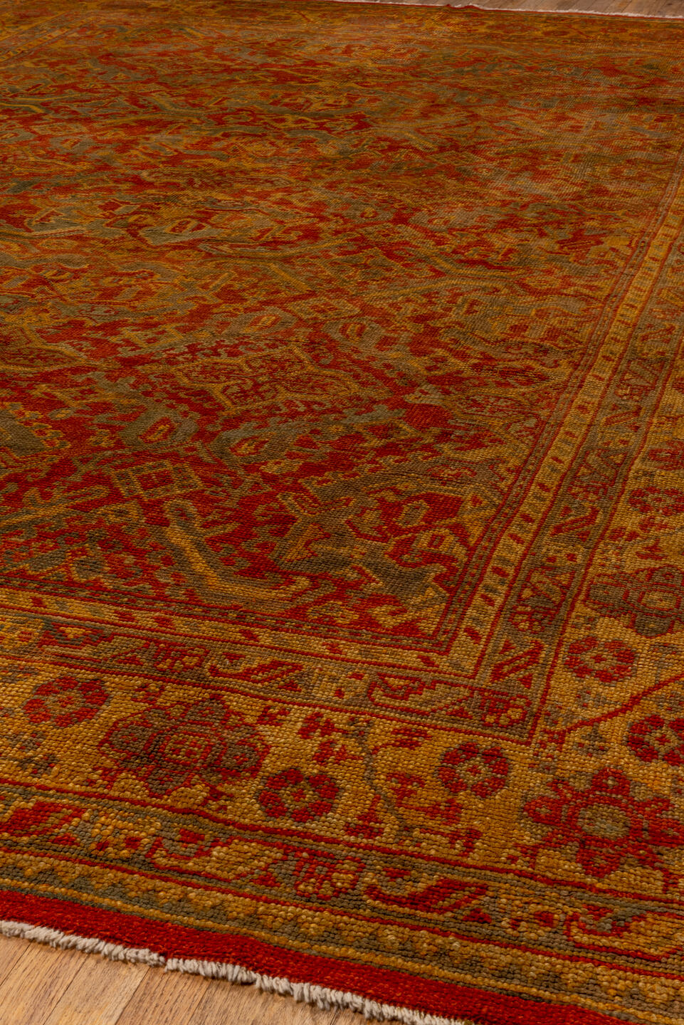 10' x 15' one-of-a-kind handmade antique Oushak rug. Color palette: rust, gold, terra cotta, slate, camel, sienna