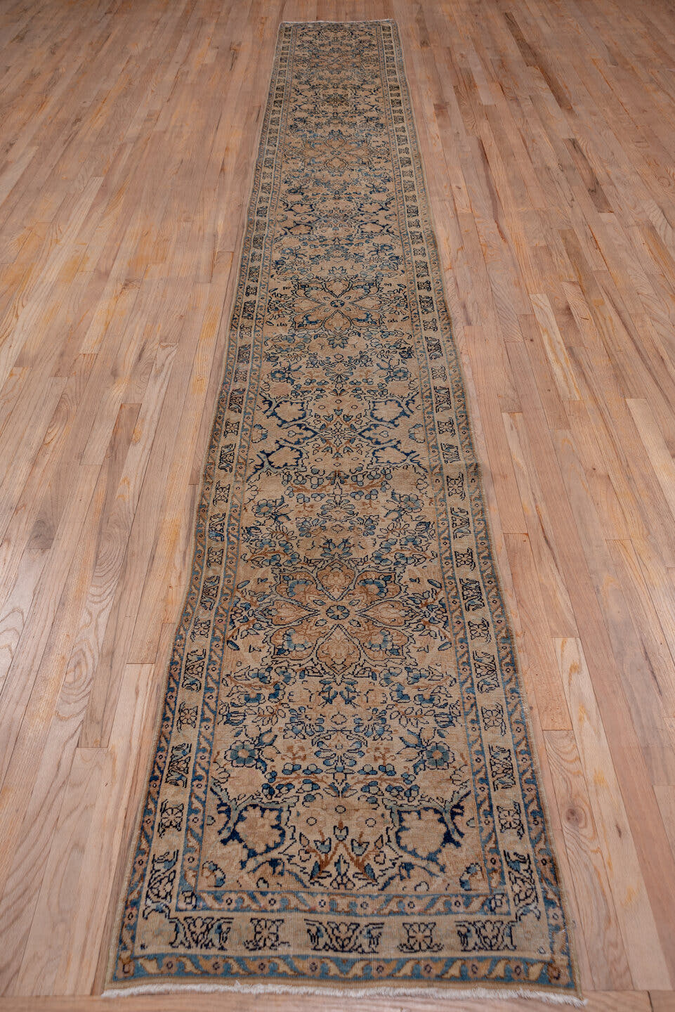 2' x 16' one-of-a-kind handmade antique Kerman runner rug. Color palette: ivory, blue, taupe, camel, slate, brown, beige