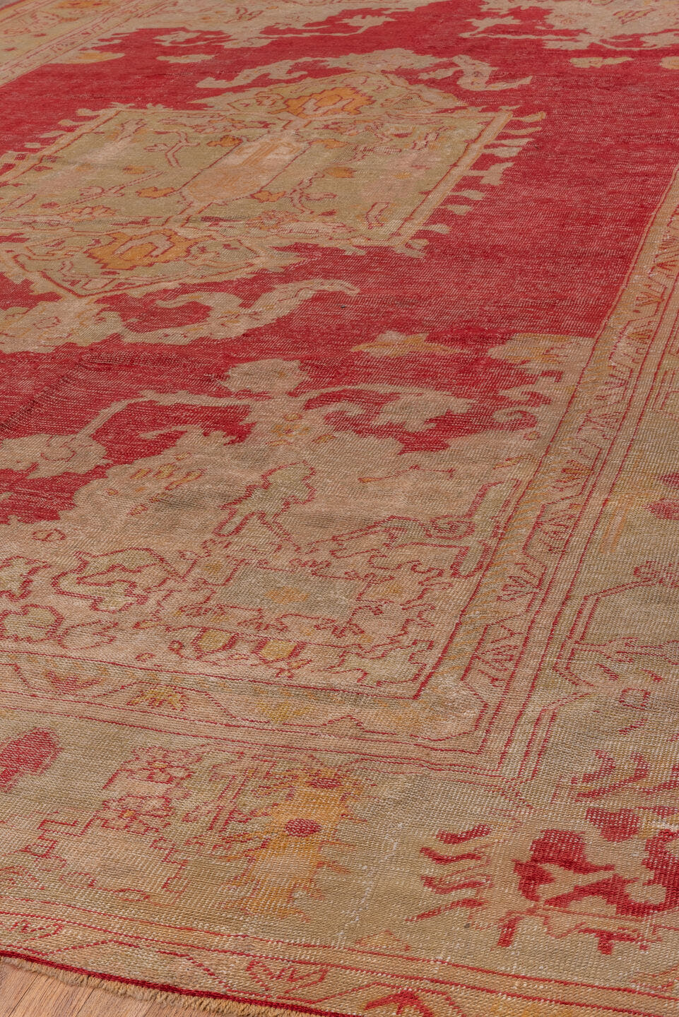 10' x 15' one-of-a-kind handmade antique Oushak rug. Color palette: rose, ivory, coral, gold, beige, saffron, pink, red