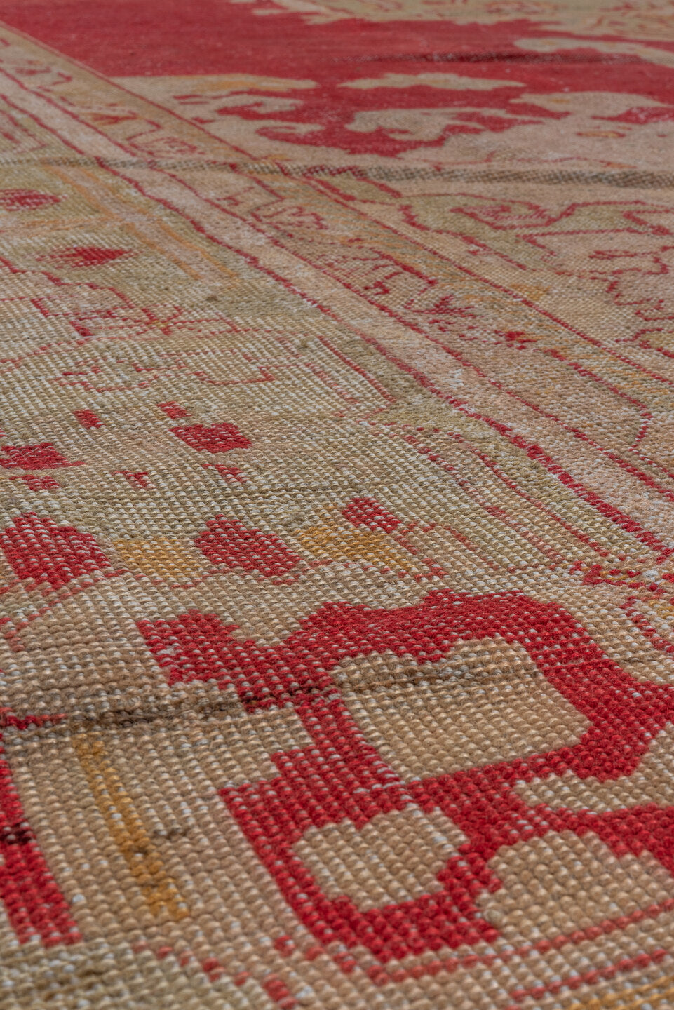 10' x 15' one-of-a-kind handmade antique Oushak rug. Color palette: rose, ivory, coral, gold, beige, saffron, pink, red