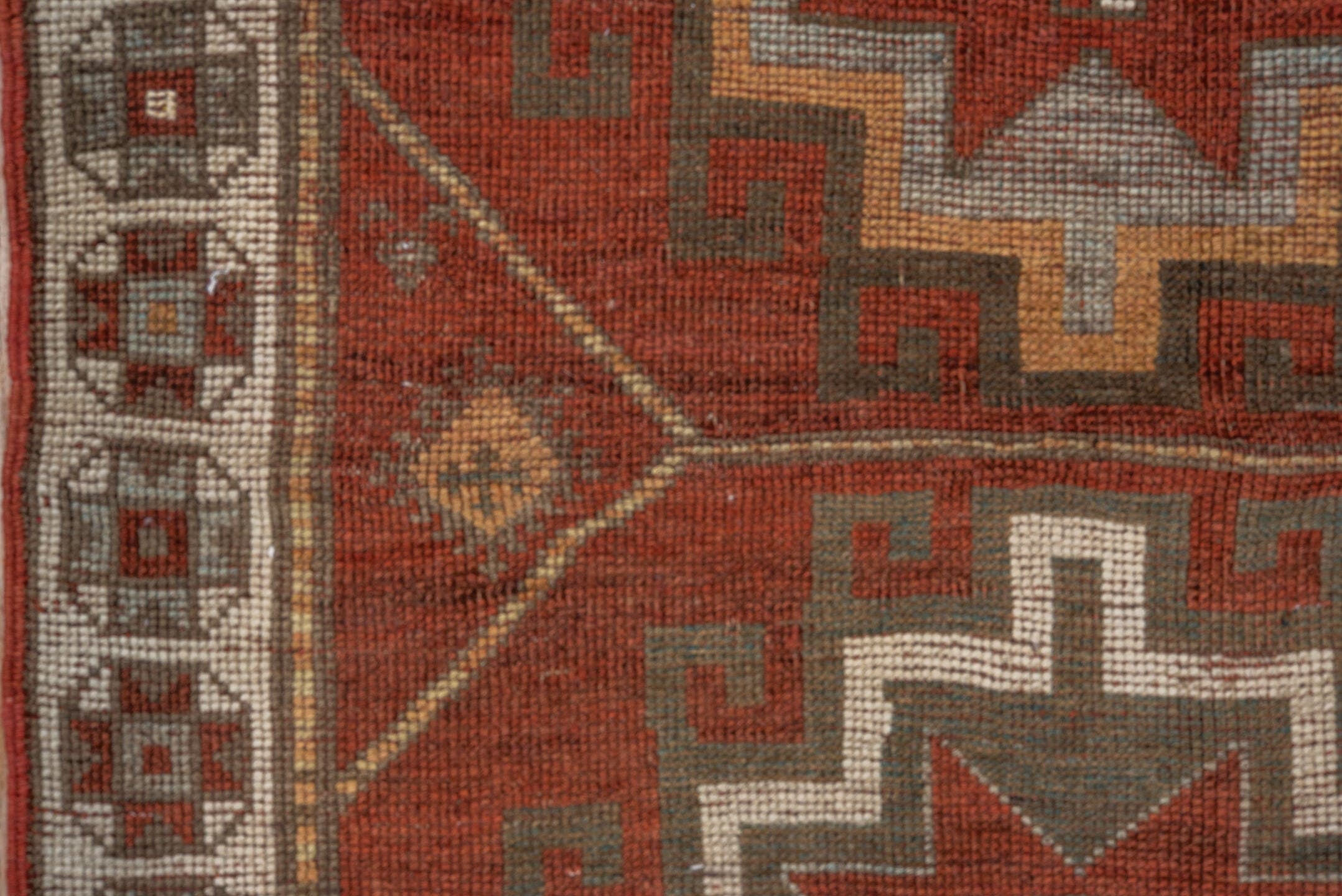 3' x 9' one-of-a-kind handmade antique Caucasian runner rug. Color palette: rust, ivory, brown, taupe, camel, gold, slate