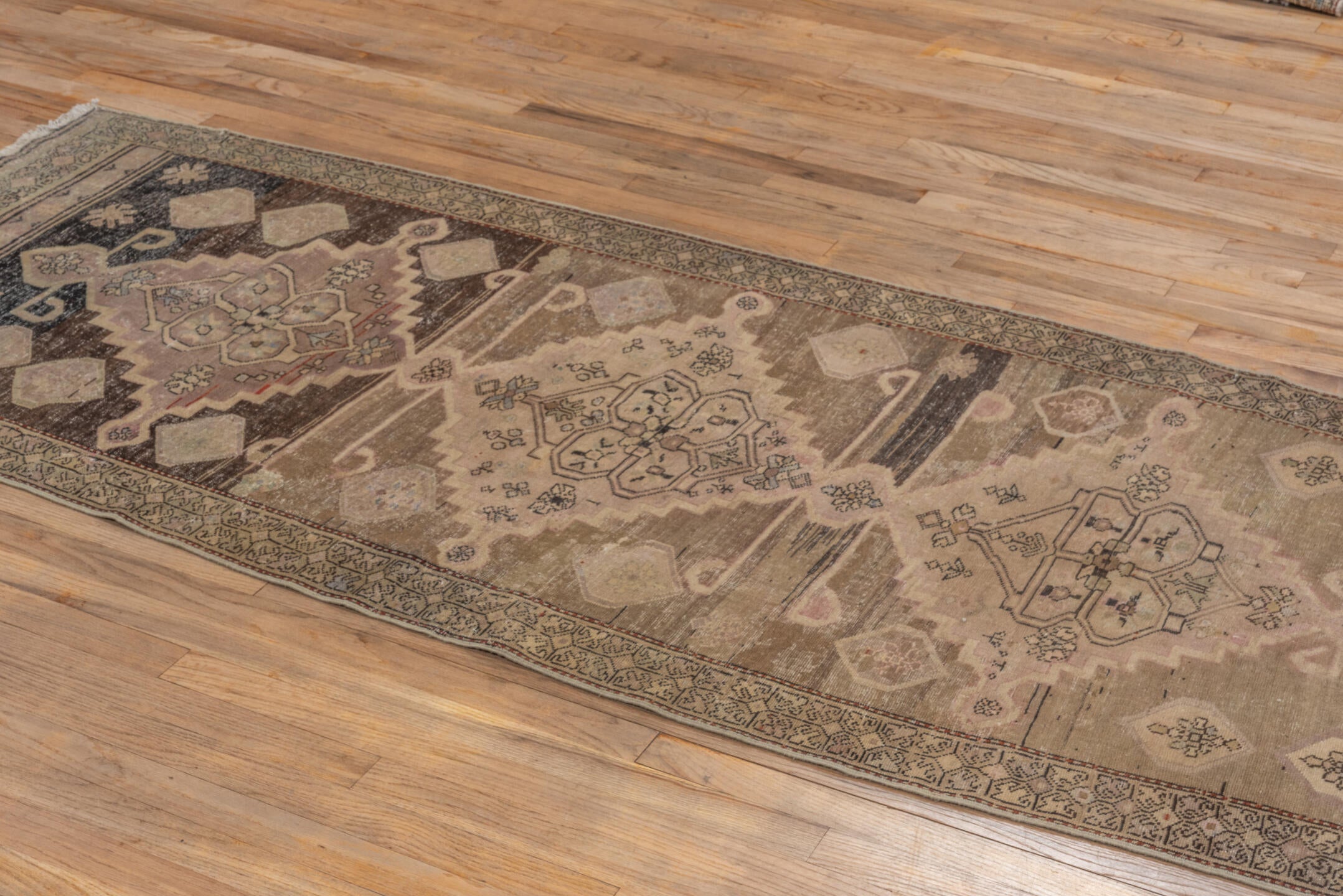 3' x 7' one-of-a-kind handmade antique Caucasian runner rug. Color palette: taupe, ivory, charcoal, blush, brown, camel