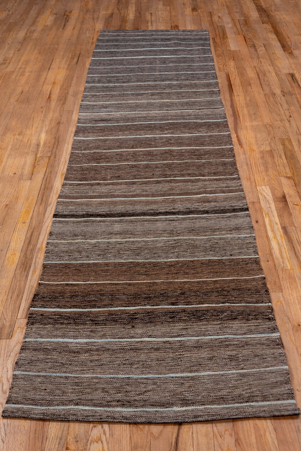 2' x 11' one-of-a-kind handmade vintage Kilim runner rug. Color palette: taupe, brown, ivory, camel, greige, beige, gray