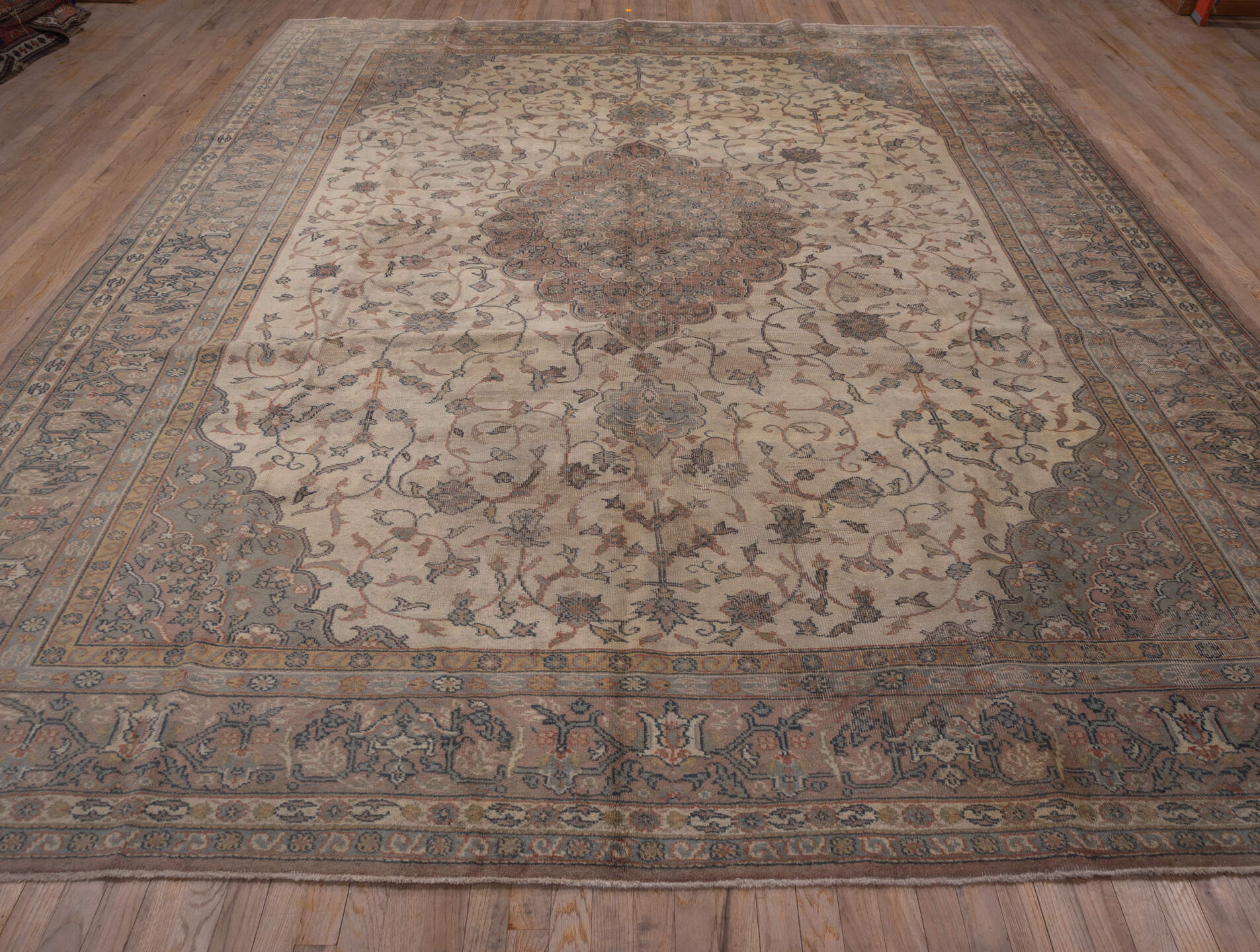 10' x 13' one-of-a-kind handmade vintage Sivas large size rug. Color palette: ivory, taupe, rose, blue-gray, camel, slate