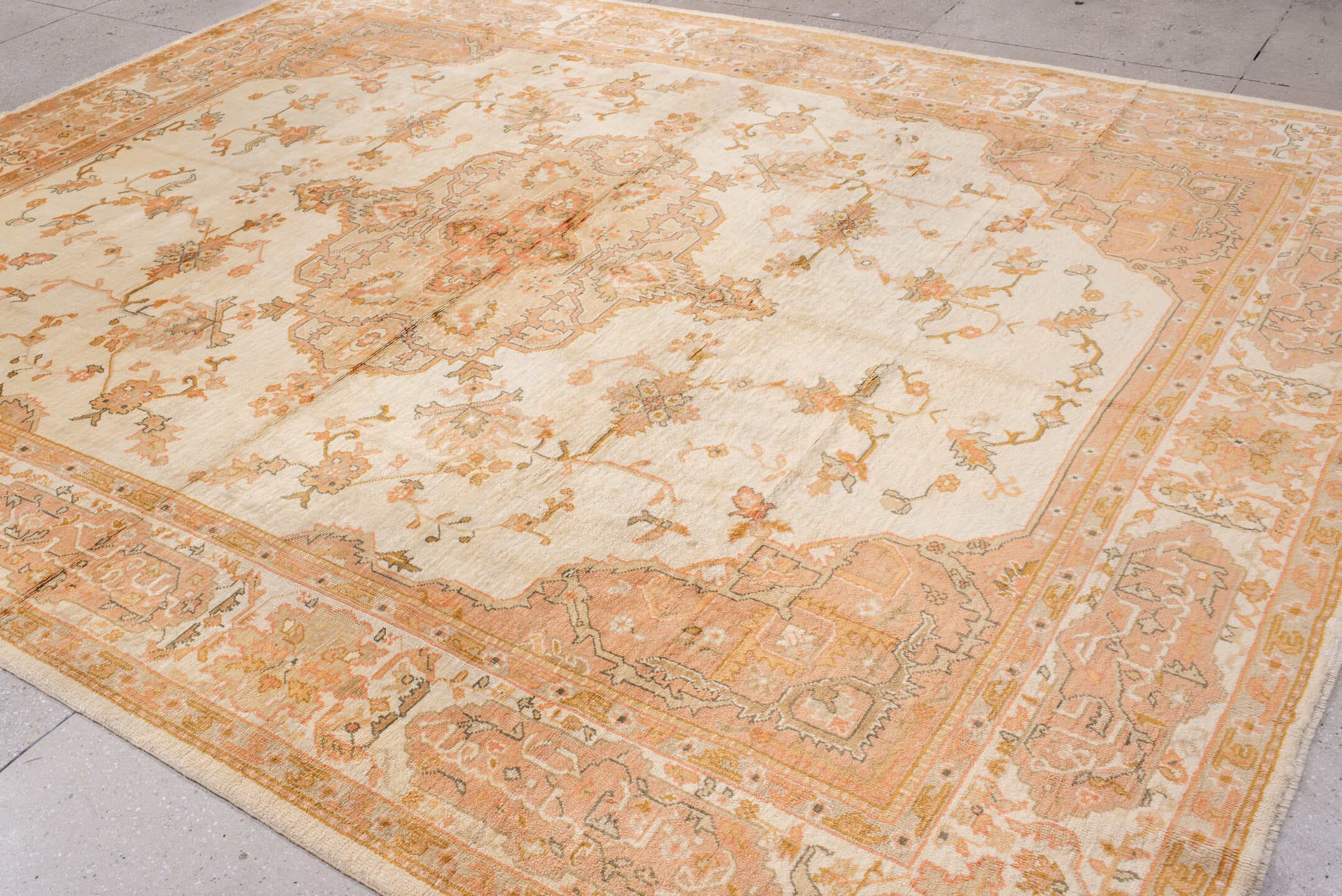 10' x 12' one-of-a-kind handmade antique Oushak large size rug. Color palette: ivory, peach, apricot, muted gold, taupe