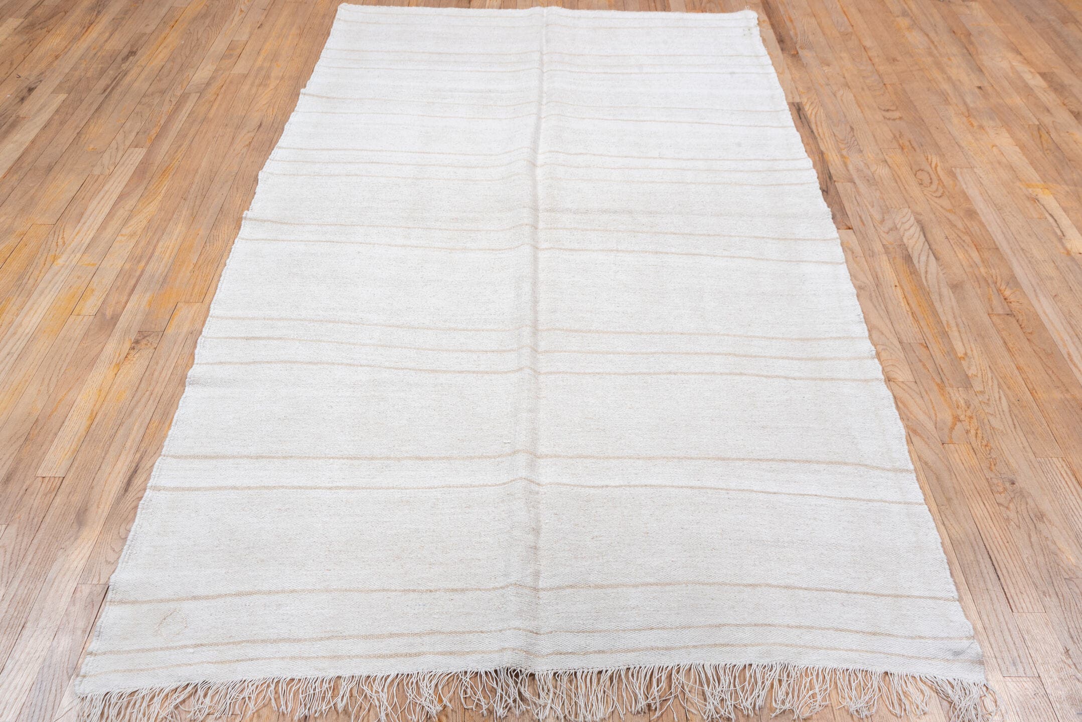 5' x 9' one-of-a-kind handmade vintage Hemp Kilim medium size rug. Color palette: ivory, cream, tan, taupe, beige, gray