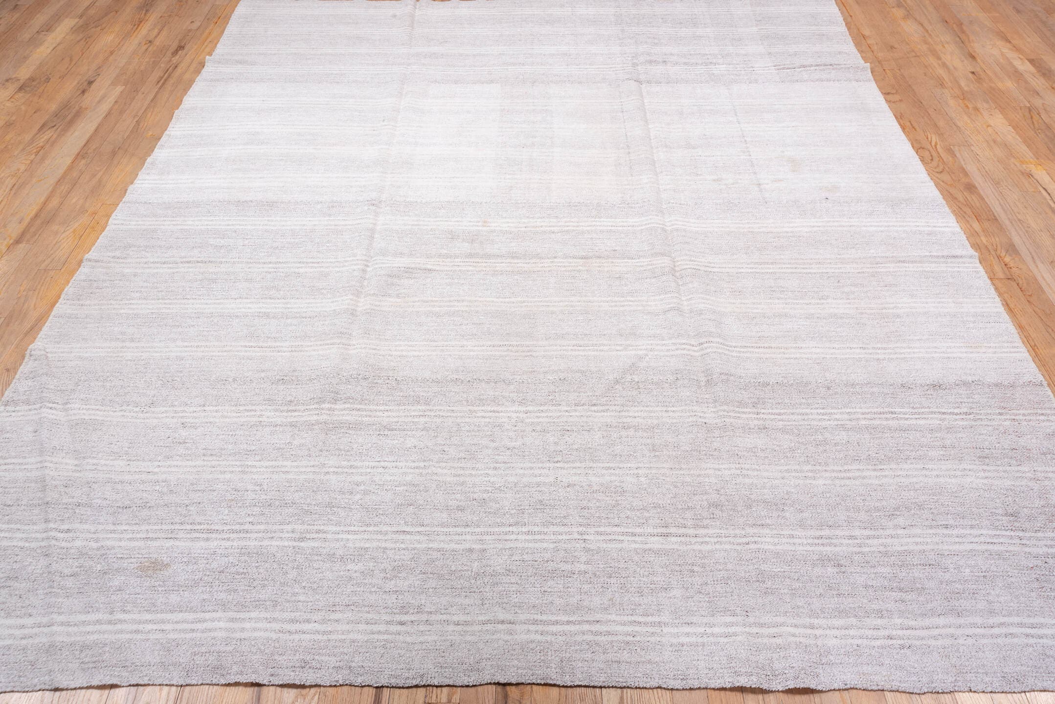 7' x 9' one-of-a-kind handmade vintage Flatweave rug. Color palette: ivory, cream, taupe, beige, light gray, gray