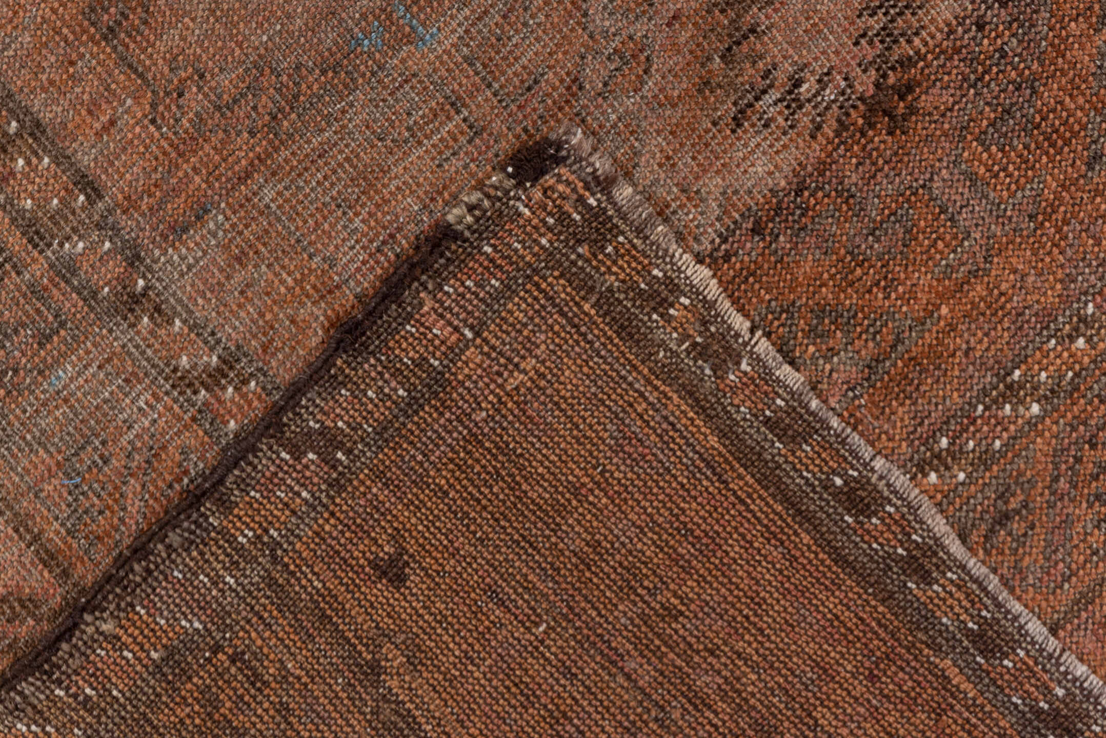 6' x 12' one-of-a-kind handmade antique Belouch large size rug. Color palette: rust, brown, charcoal, taupe, rose, slate