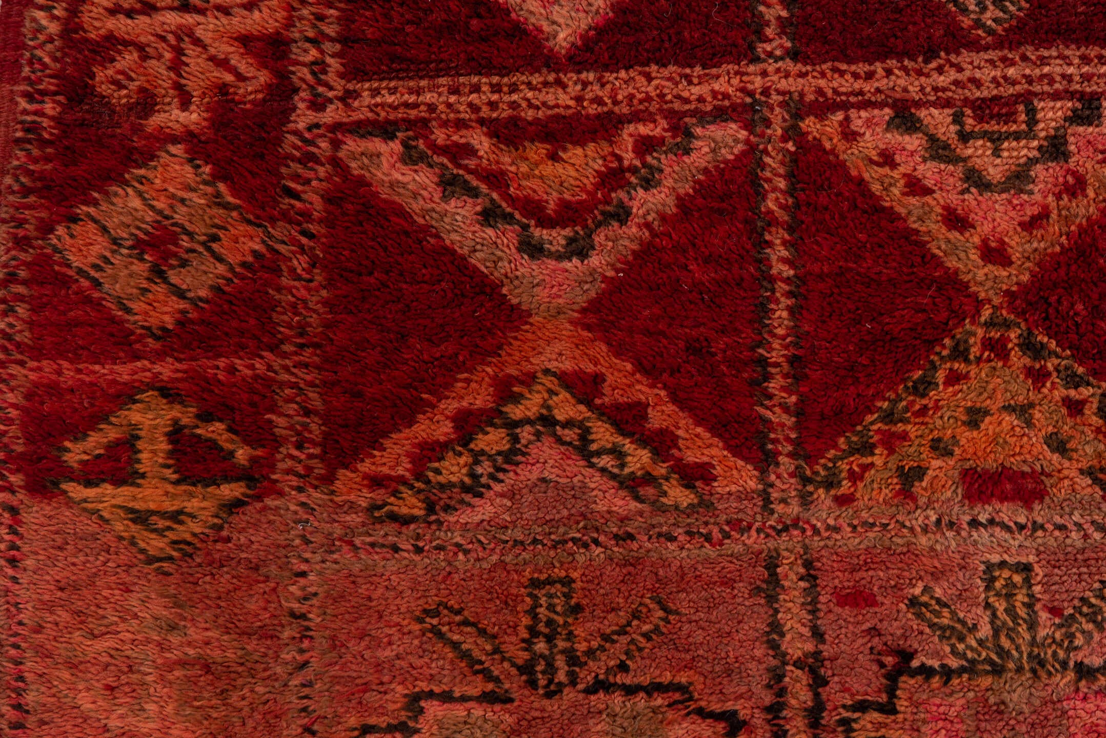 5' x 9' one-of-a-kind handmade vintage Moroccan medium size rug. Color palette: rust, rose, blush, burgundy, muted gold