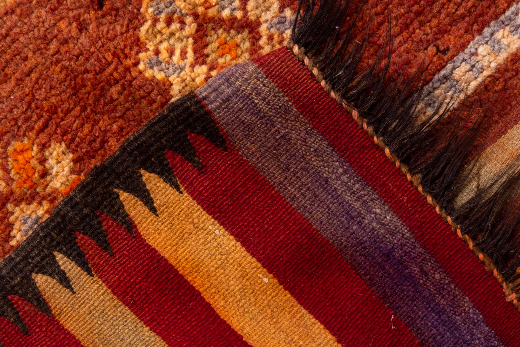5' x 12' one-of-a-kind handmade vintage Moroccan rug. Color palette: rust, terra cotta, ivory, brown, camel, slate