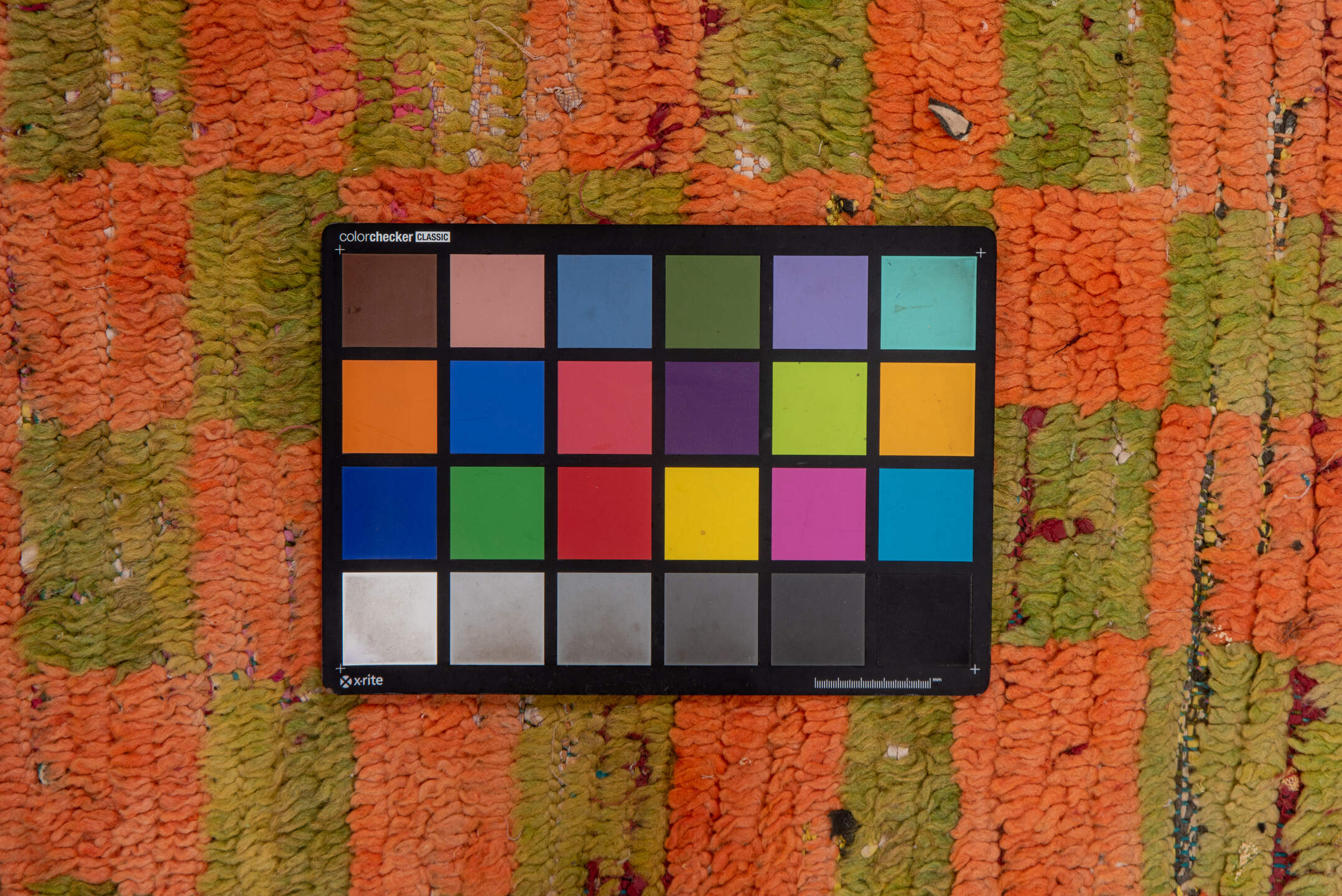 2' x 6' one-of-a-kind handmade vintage Moroccan runner rug. Color palette: brown, gray, light gray, off-white, orange, pink