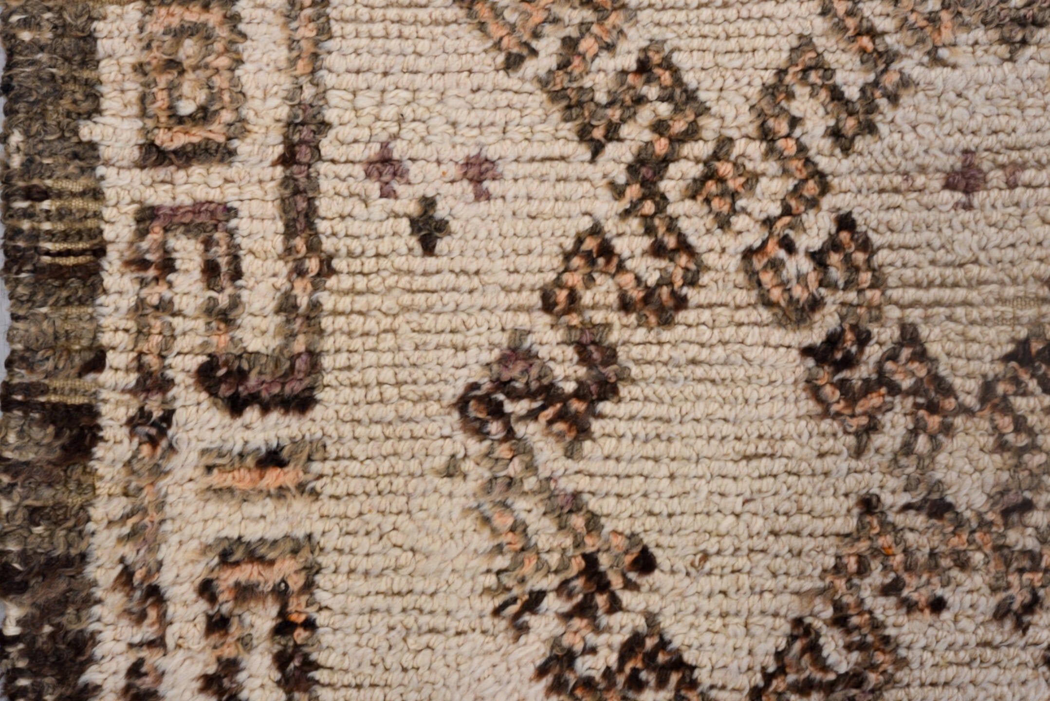 5' x 11' one-of-a-kind handmade vintage Moroccan rug. Color palette: black, brown, gray, light gray, off-white, pink, snow