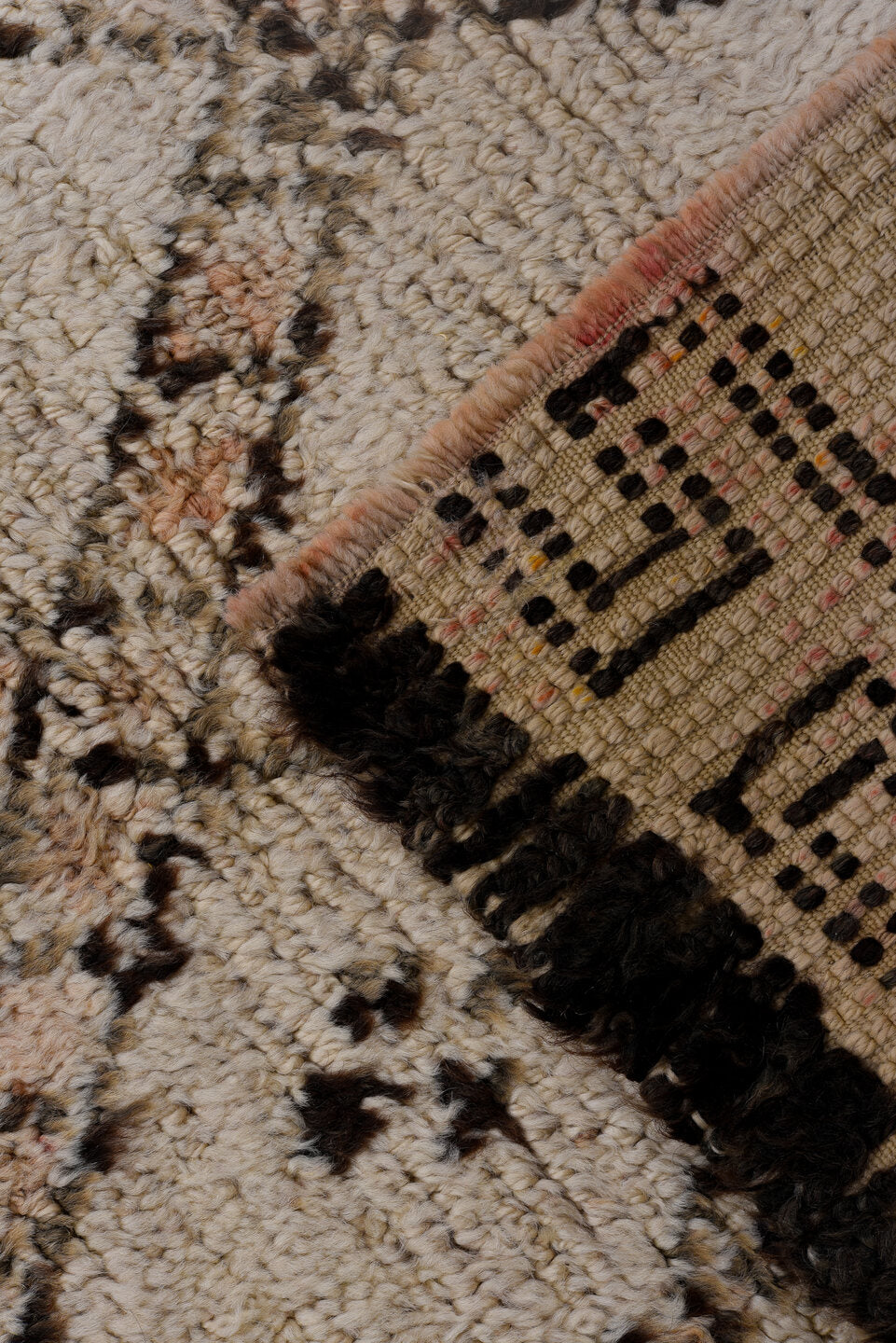5' x 11' one-of-a-kind handmade vintage Moroccan rug. Color palette: black, brown, gray, light gray, off-white, pink, snow