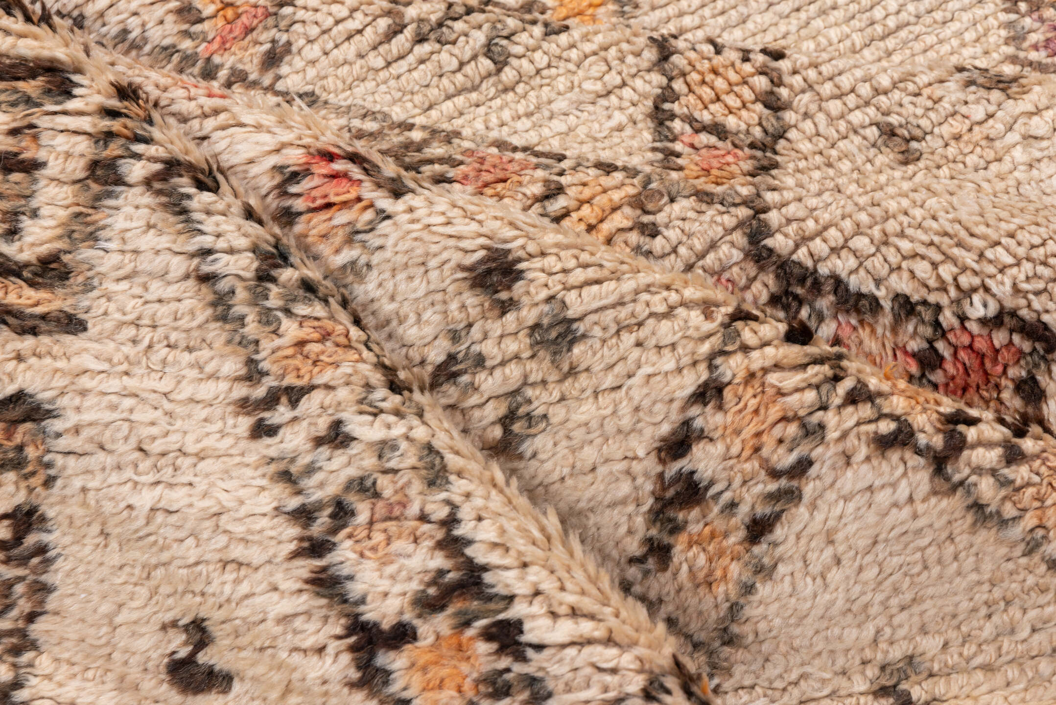 5' x 11' one-of-a-kind handmade vintage Moroccan rug. Color palette: black, brown, gray, light gray, off-white, pink, snow