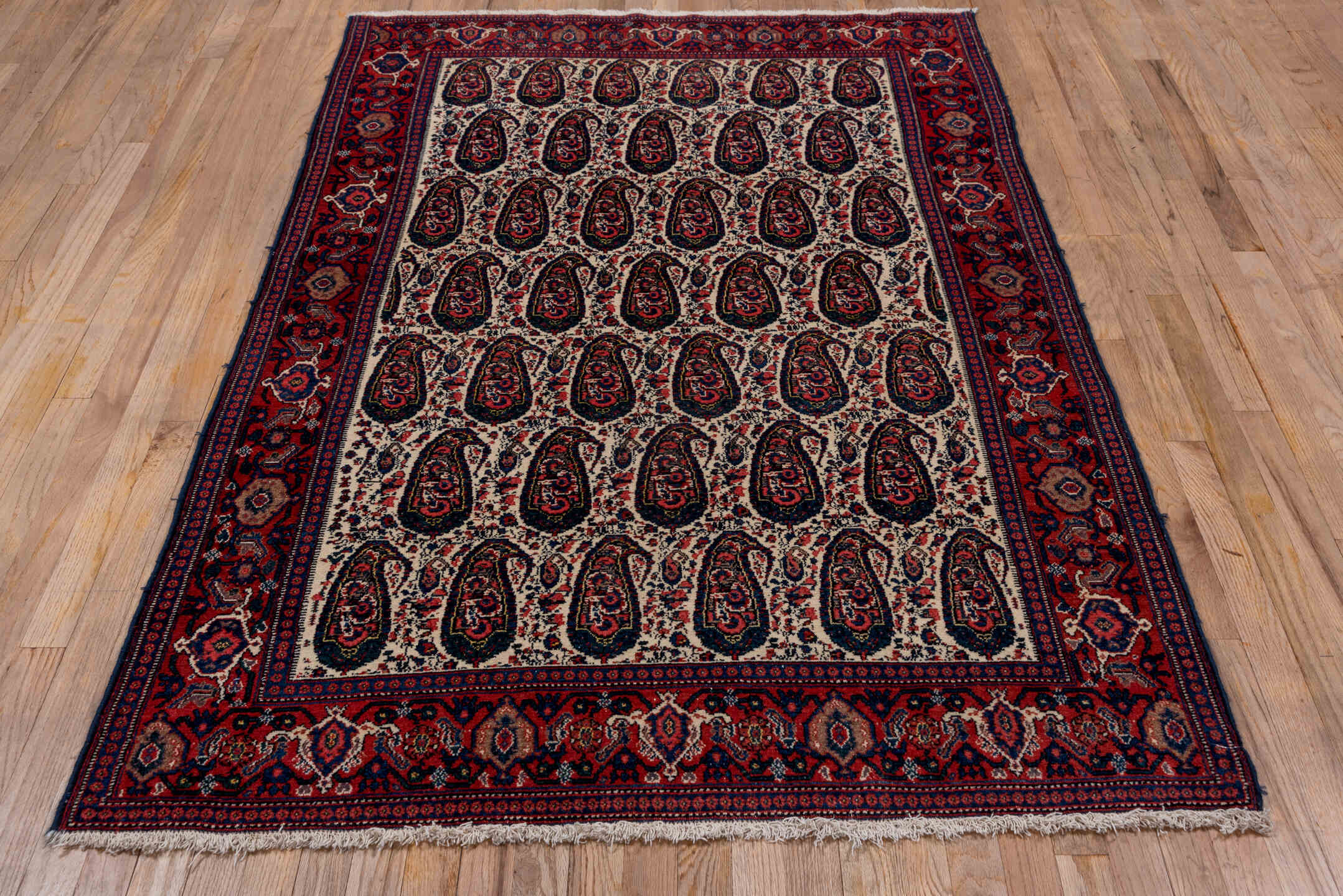 4' x 6' one-of-a-kind handmade antique Senne small size rug. Color palette: ivory, rust, navy, crimson, indigo, camel