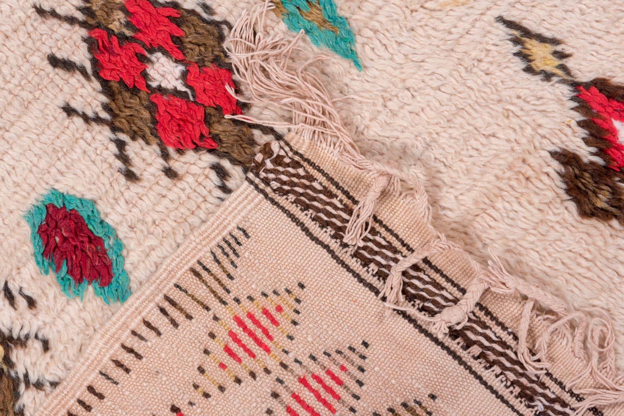 3' x 7' one-of-a-kind handmade vintage Moroccan rug. Color palette: ivory, crimson, turquoise, brown, gold, taupe, red, teal