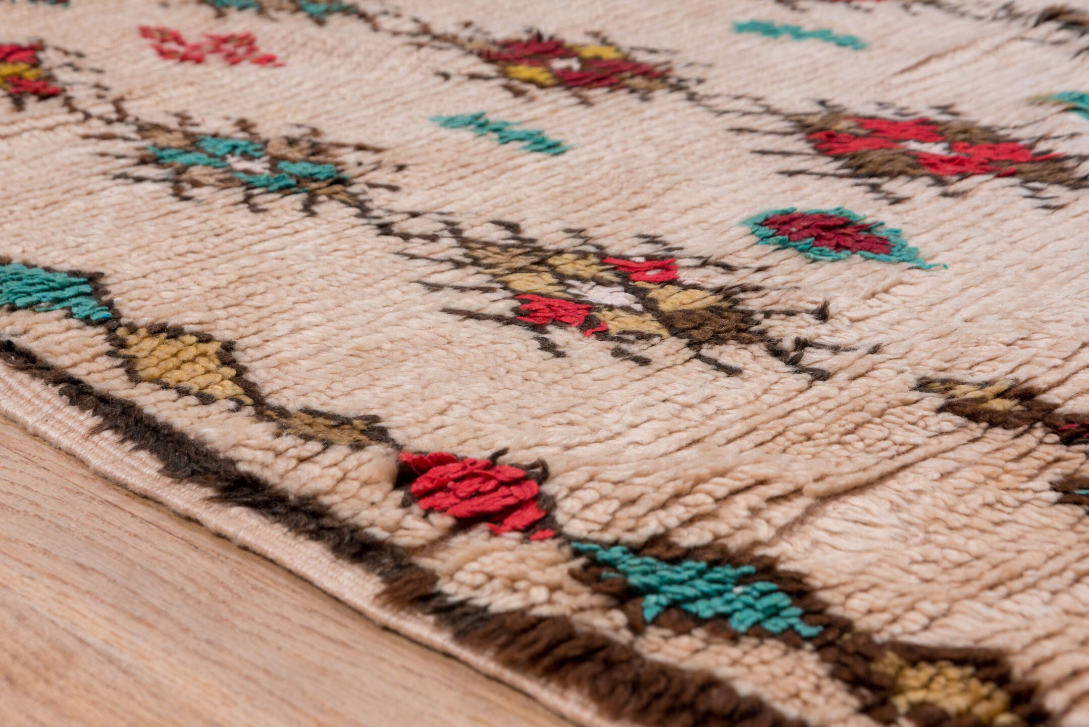3' x 7' one-of-a-kind handmade vintage Moroccan rug. Color palette: ivory, crimson, turquoise, brown, gold, taupe, red, teal