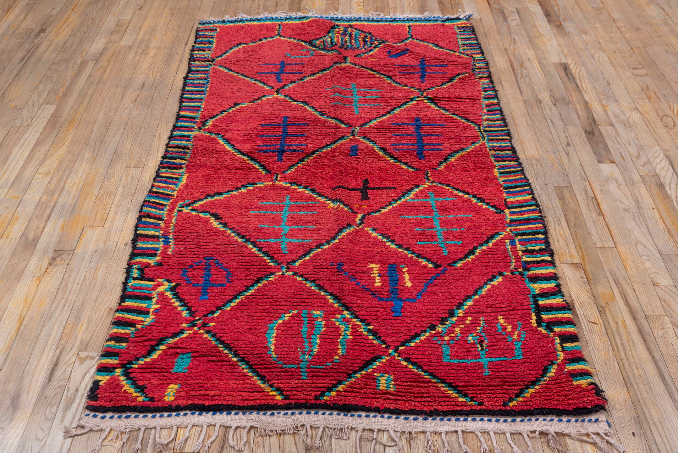 3' x 6' one-of-a-kind handmade vintage Moroccan small size rug. Color palette: coral, turquoise, cobalt, black, ivory, rose