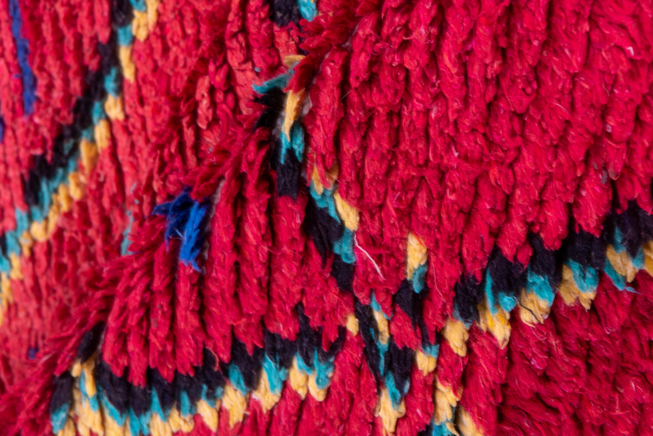 3' x 6' one-of-a-kind handmade vintage Moroccan small size rug. Color palette: coral, turquoise, cobalt, black, ivory, rose