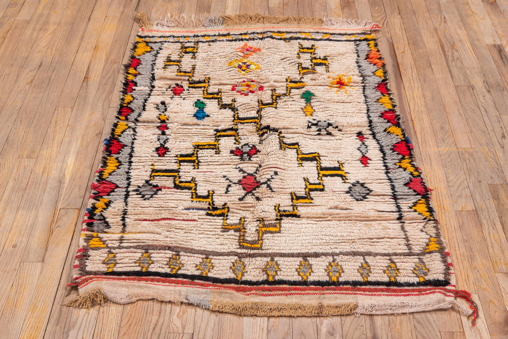 3' x 5' one-of-a-kind handmade vintage Moroccan small size rug. Color palette: ivory, charcoal, gold, crimson, gray, orange