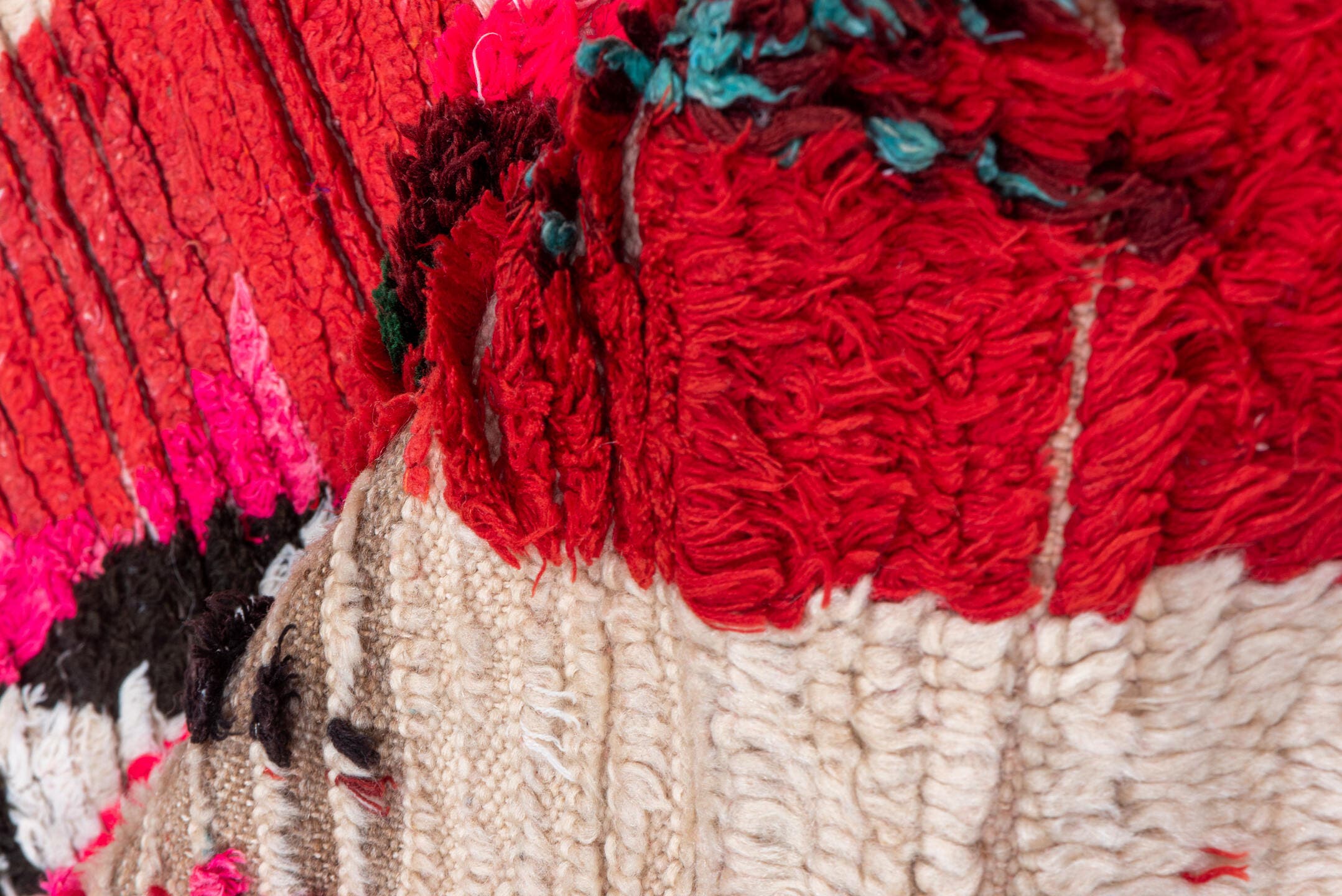 4' x 5' one-of-a-kind handmade vintage Moroccan small size rug. Color palette: red, ivory, black, fuchsia, turquoise