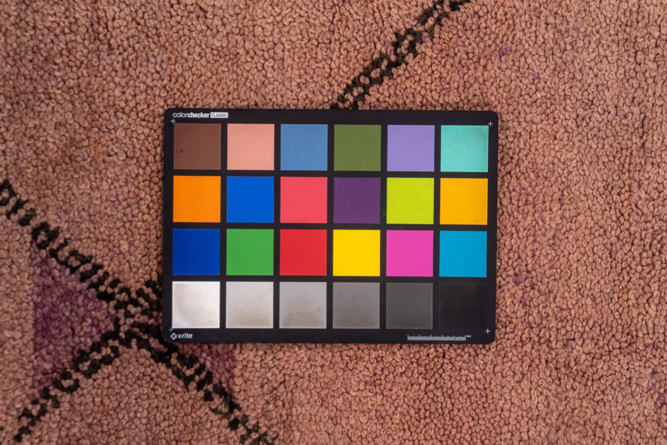 5' x 9' one-of-a-kind handmade vintage Moroccan medium size rug. Color palette: black, brown, gray, light gray, off-white