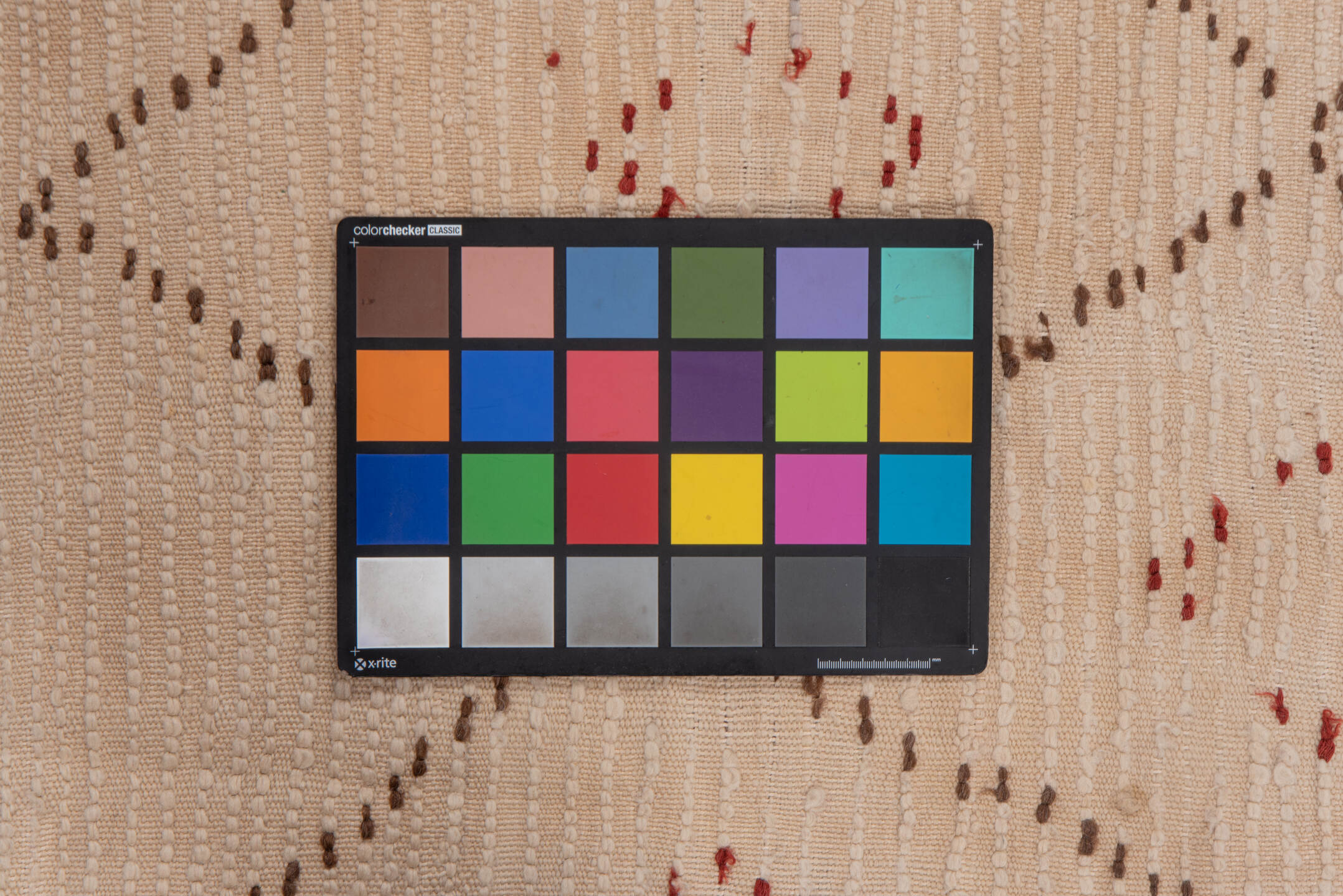 5' x 10' one-of-a-kind handmade vintage Moroccan medium size rug. Color palette: black, brown, dark red, dark salmon