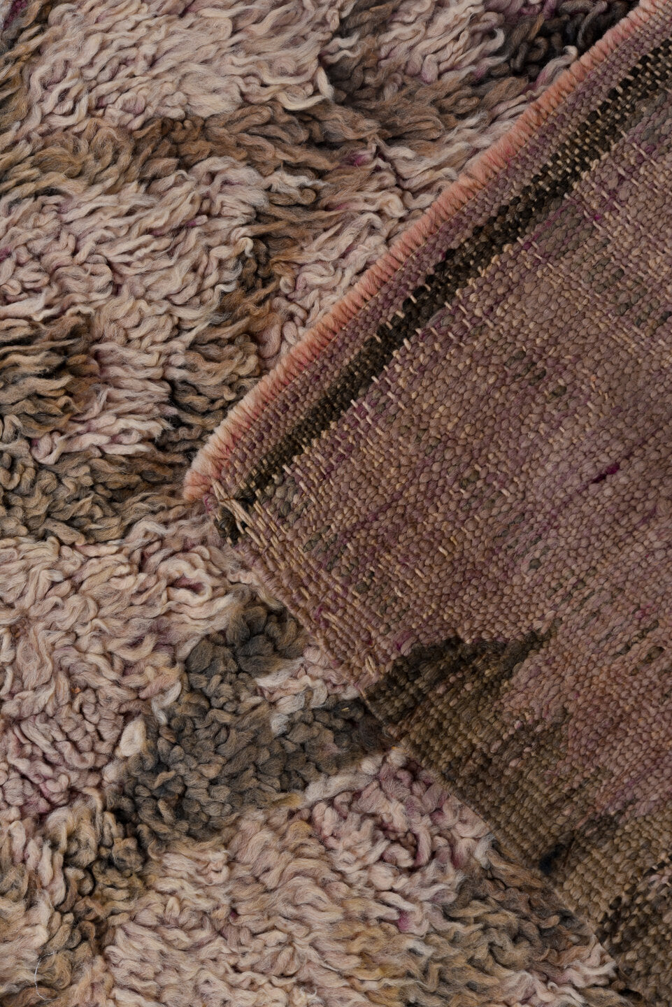 5' x 10' one-of-a-kind handmade vintage Moroccan medium size rug. Color palette: brown, gray, light gray, off-white, pink