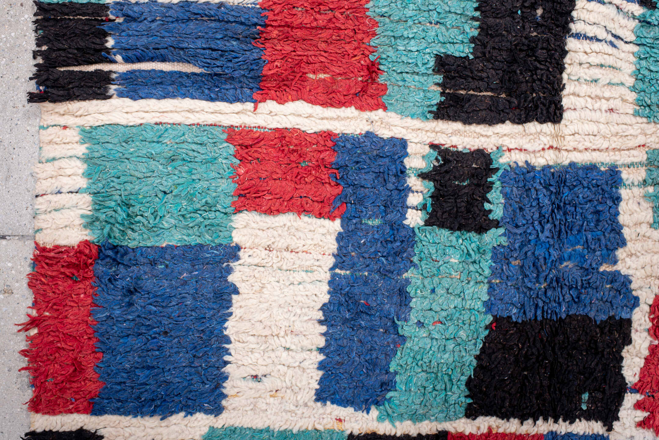 4' x 6' one-of-a-kind handmade vintage Moroccan small size rug. Color palette: ivory, cobalt, red, turquoise, black, blue