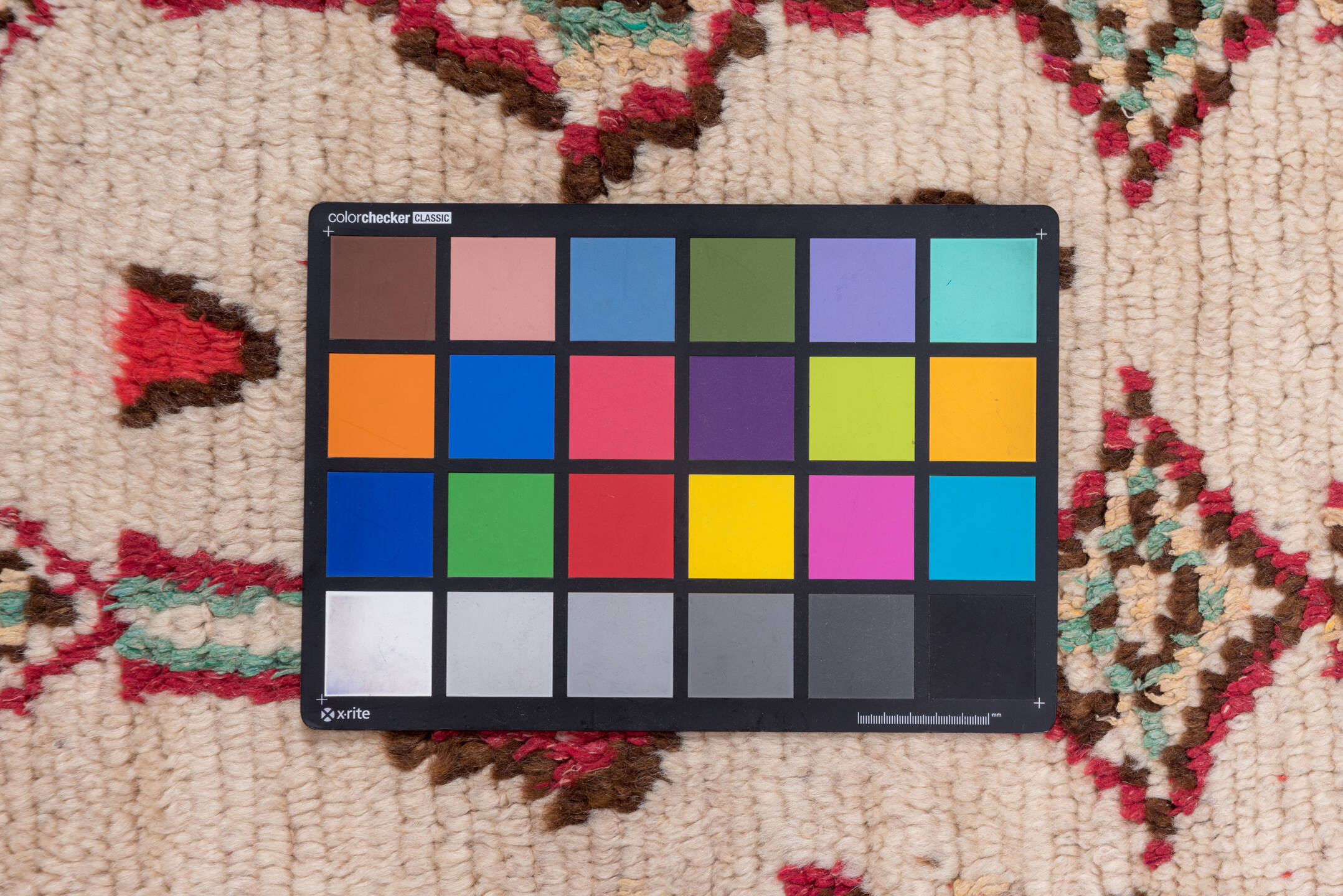 4' x 6' one-of-a-kind handmade vintage Moroccan small size rug. Color palette: brown, gray, light gray, off-white, pink, red