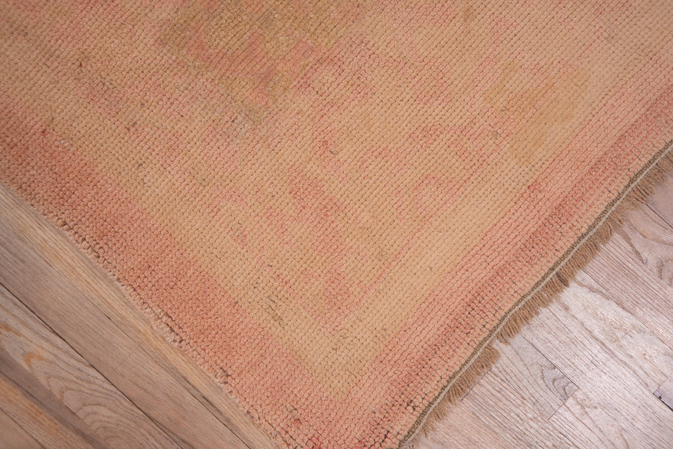 3' x 11' one-of-a-kind handmade antique Oushak runner rug. Color palette: blush, rose, peach, taupe, camel, pink, red