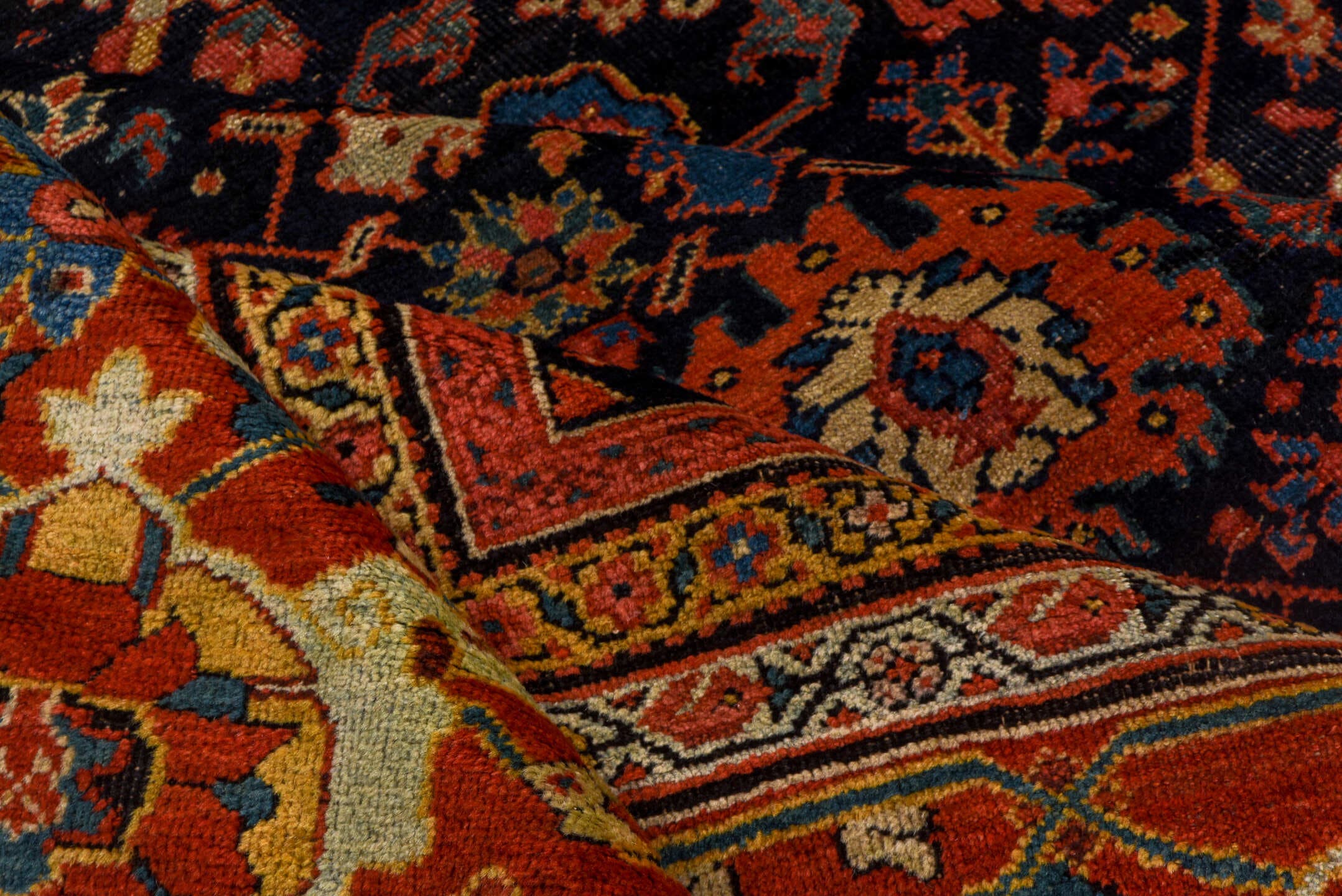 14' x 19' one-of-a-kind handmade antique Sultanabad oversize rug. Color palette: navy, rust, ivory, sky blue, terra cotta