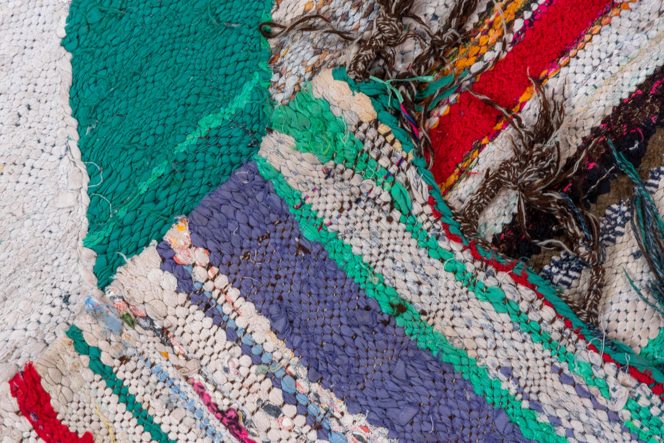 5' x 8' one-of-a-kind handmade vintage Rag Rug medium size rug. Color palette: ivory, black, teal, red, sky_blue, violet