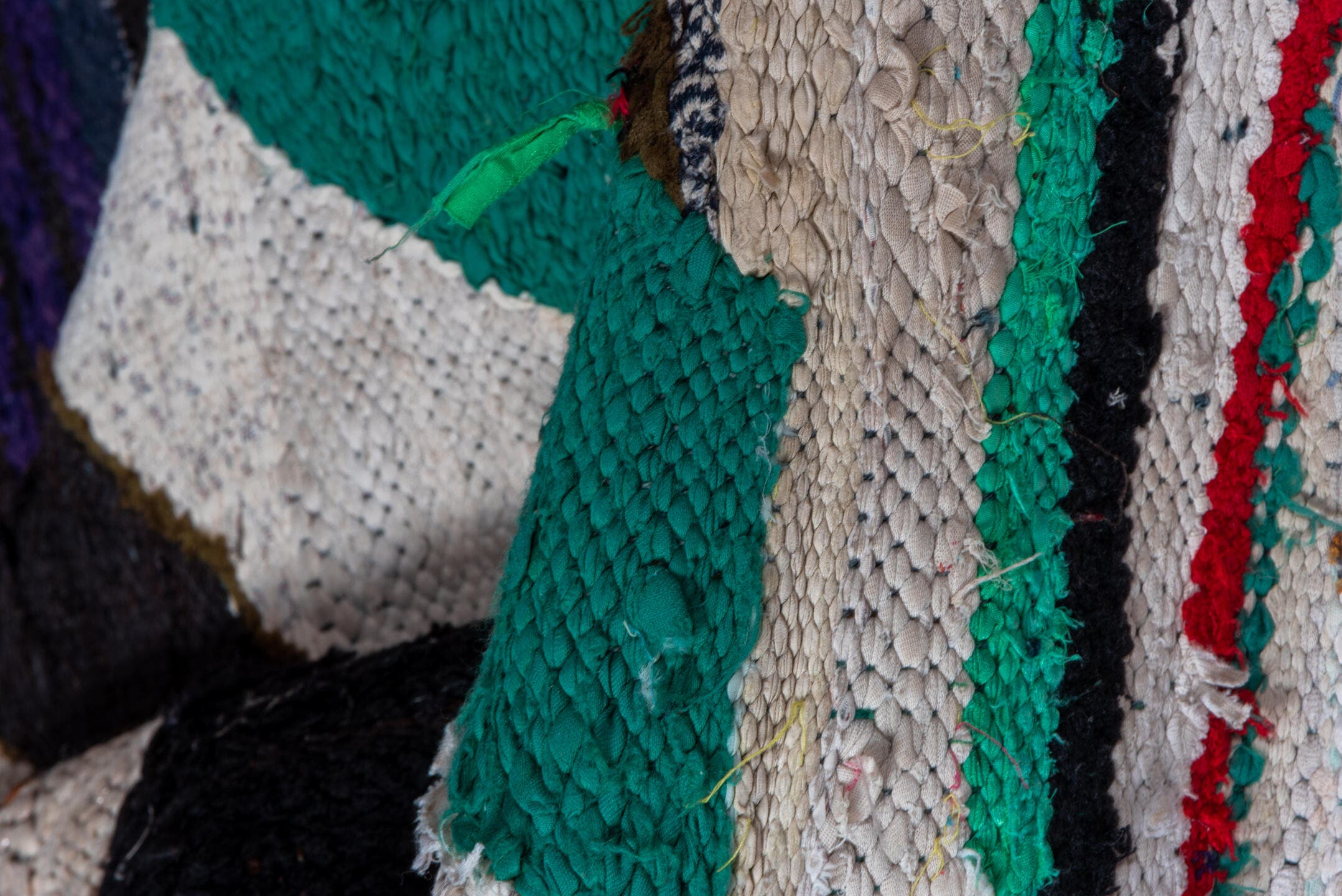 5' x 8' one-of-a-kind handmade vintage Rag Rug medium size rug. Color palette: ivory, black, teal, red, sky_blue, violet