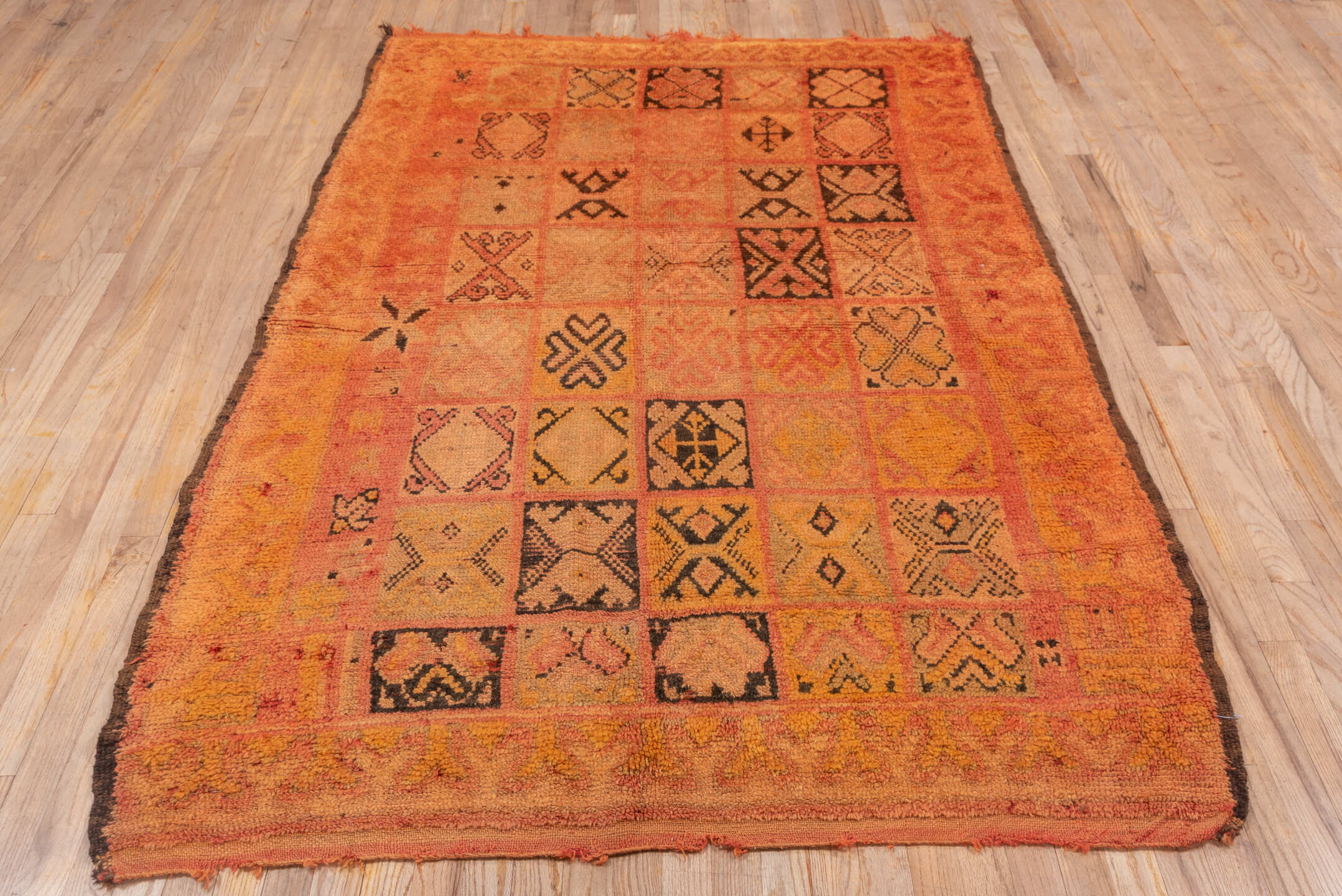 4' x 7' one-of-a-kind handmade vintage Moroccan rug. Color palette: salmon, terra cotta, peach, coral, charcoal, rose