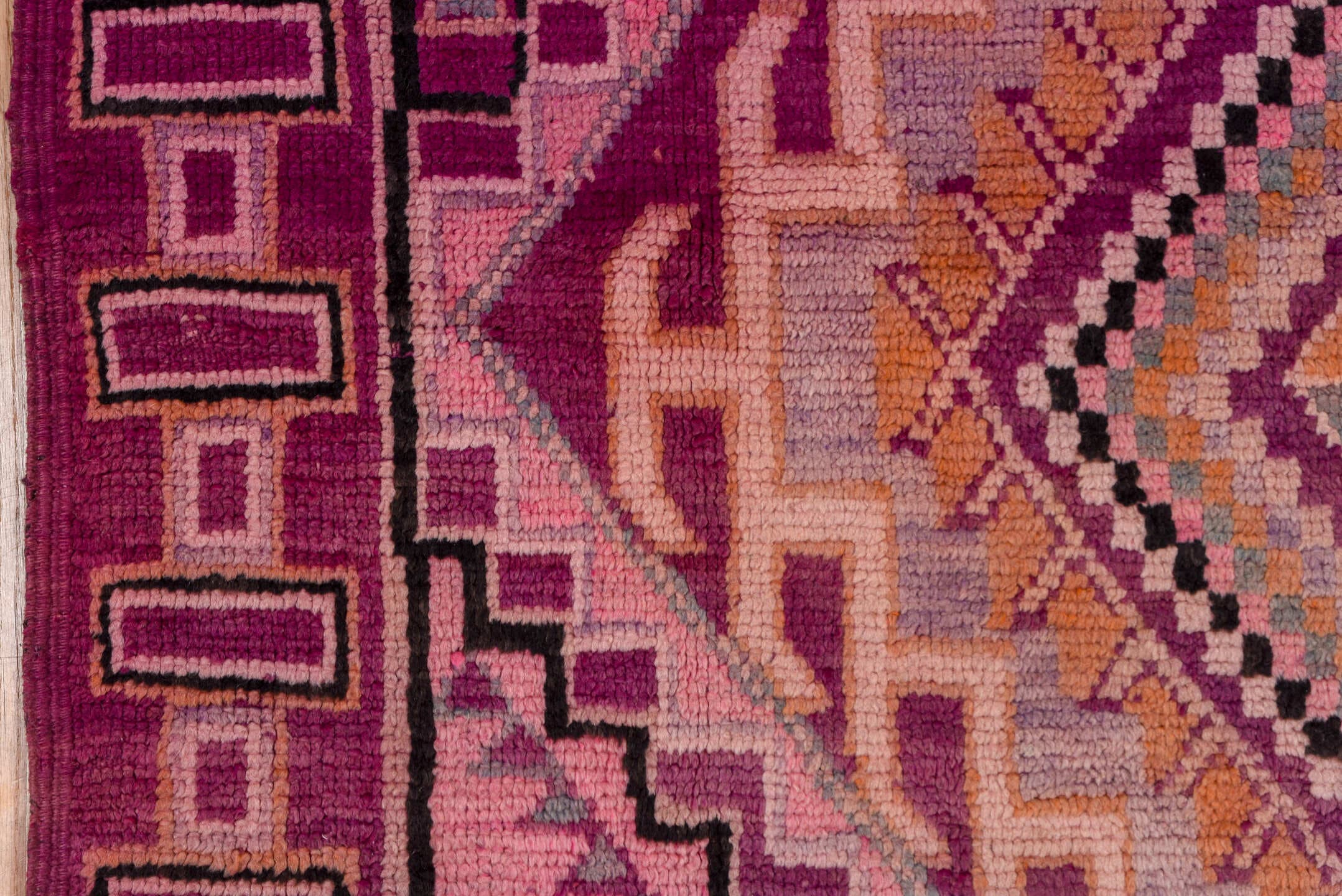 5' x 8' one-of-a-kind handmade vintage Moroccan medium size rug. Color palette: magenta, rose, mauve, peach, plum, lavender