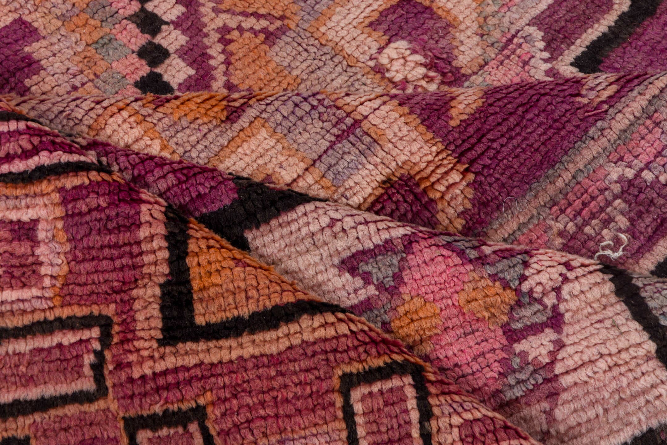 5' x 8' one-of-a-kind handmade vintage Moroccan medium size rug. Color palette: magenta, rose, mauve, peach, plum, lavender