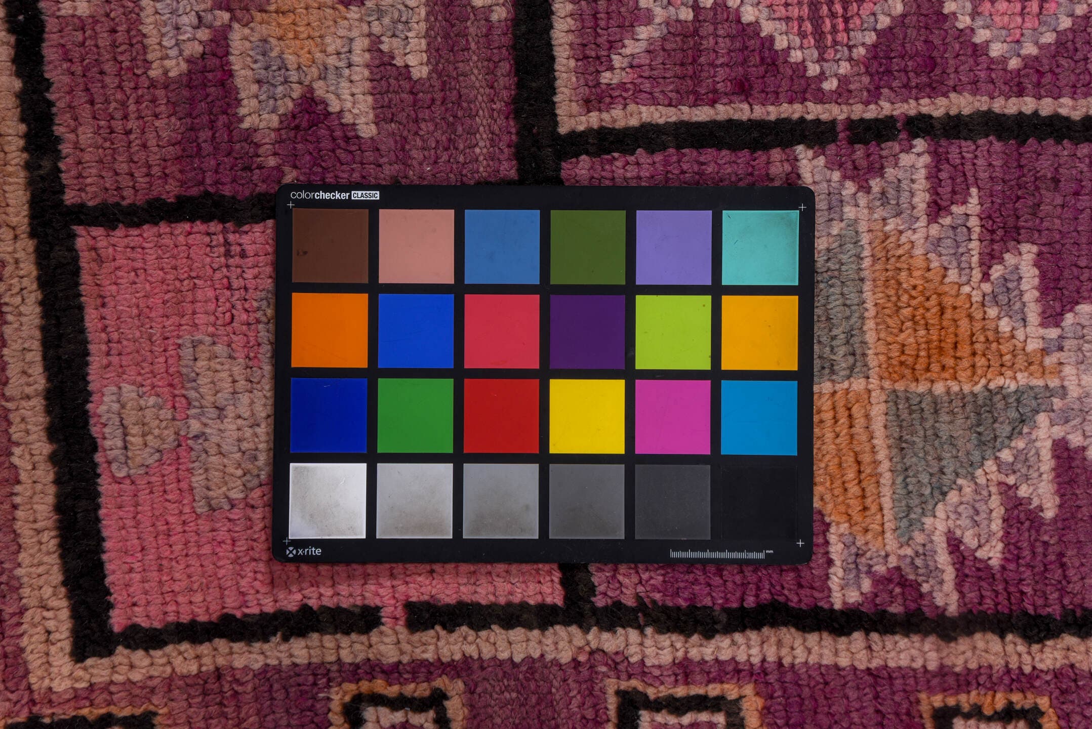 5' x 8' one-of-a-kind handmade vintage Moroccan medium size rug. Color palette: magenta, rose, mauve, peach, plum, lavender