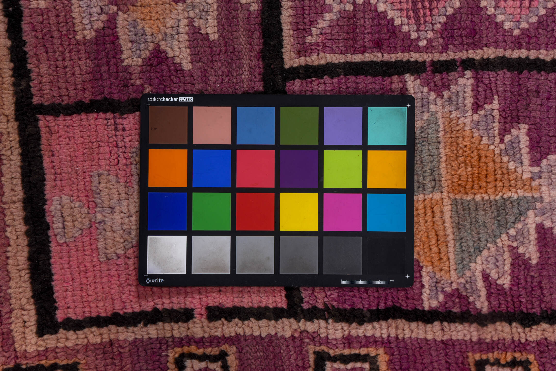 5' x 8' one-of-a-kind handmade vintage Moroccan medium size rug. Color palette: magenta, rose, mauve, peach, plum, lavender