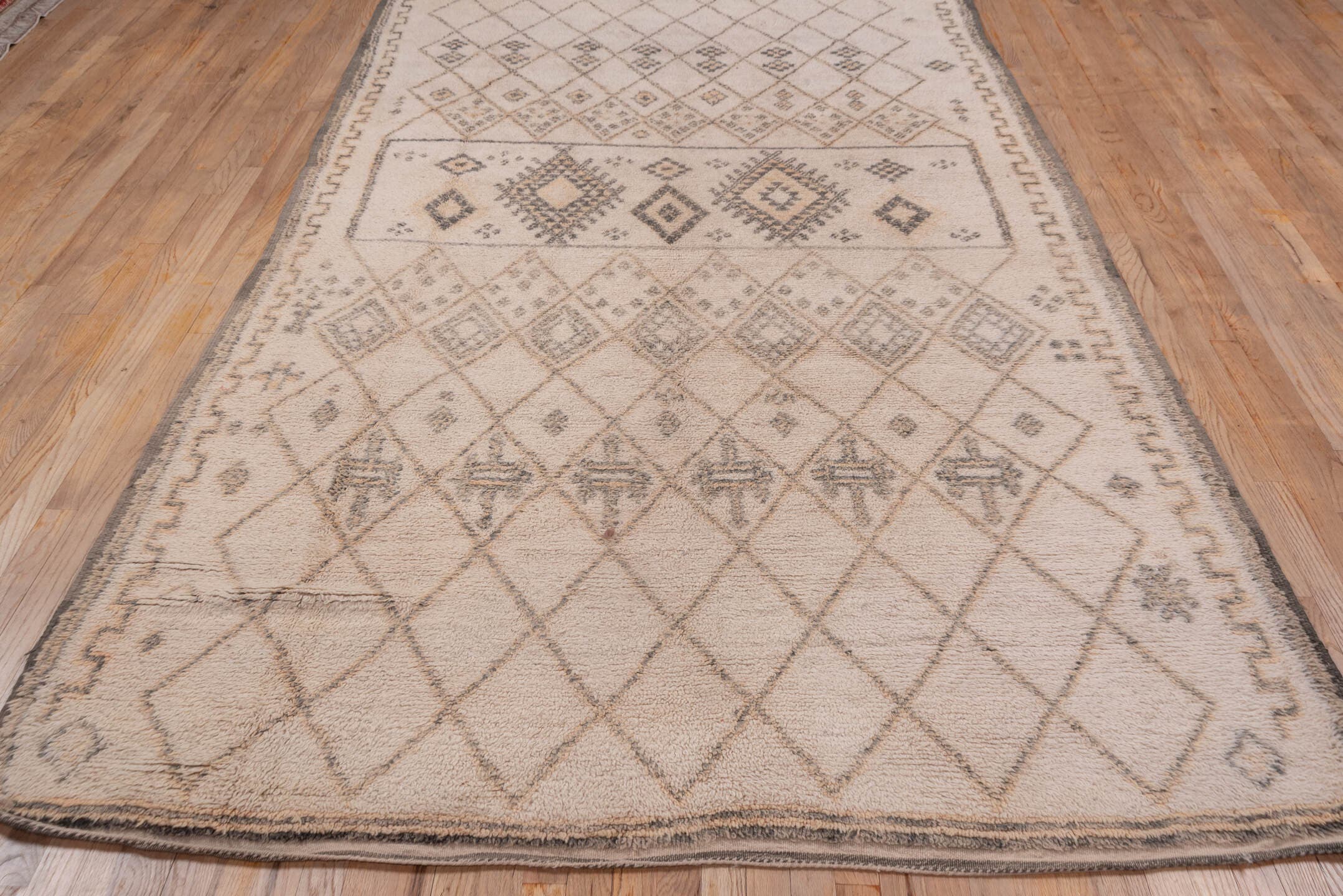 6' x 11' one-of-a-kind handmade vintage Moroccan large size rug. Color palette: ivory, charcoal, taupe, camel, gray, black
