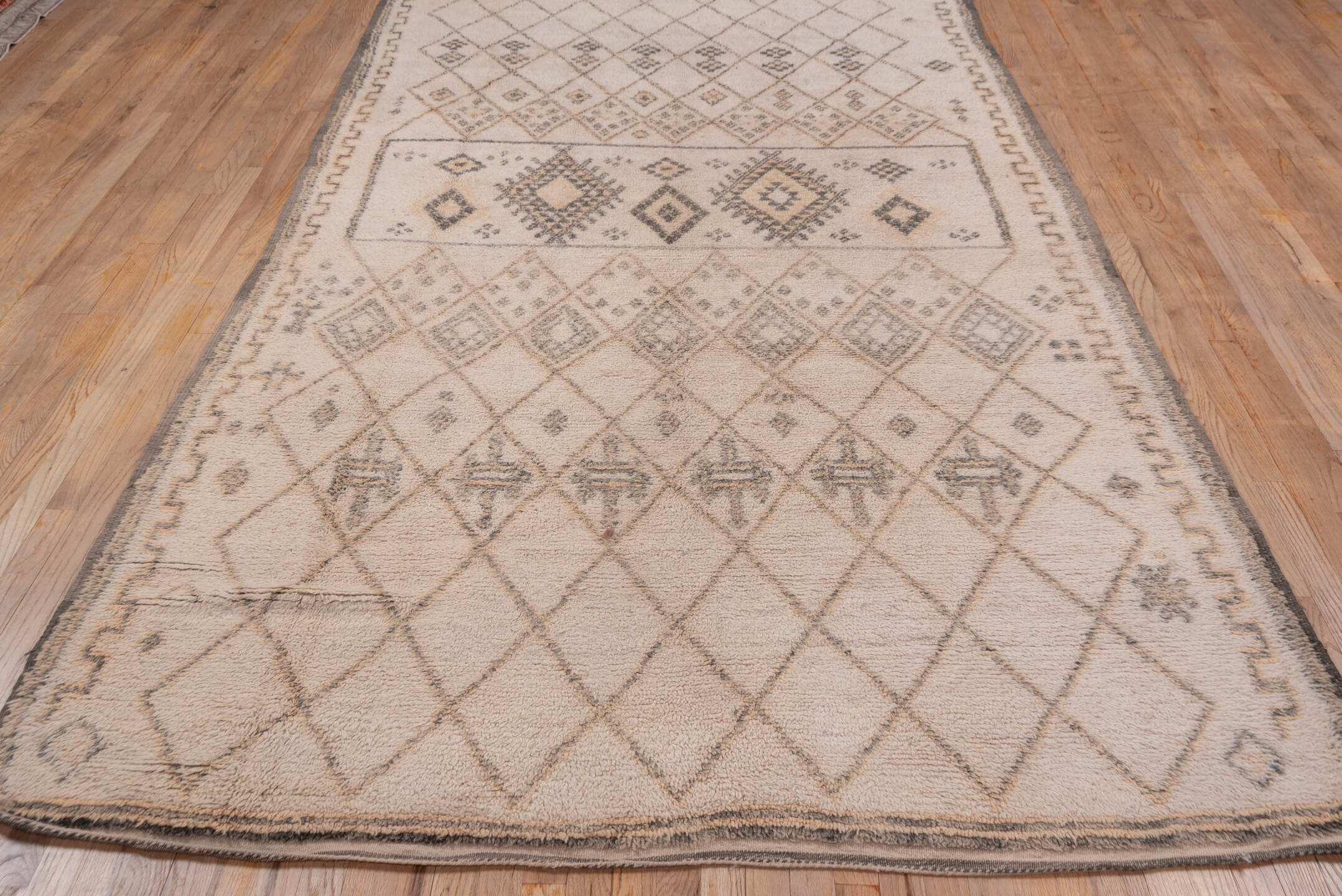 6' x 11' one-of-a-kind handmade vintage Moroccan large size rug. Color palette: ivory, charcoal, taupe, camel, gray, black