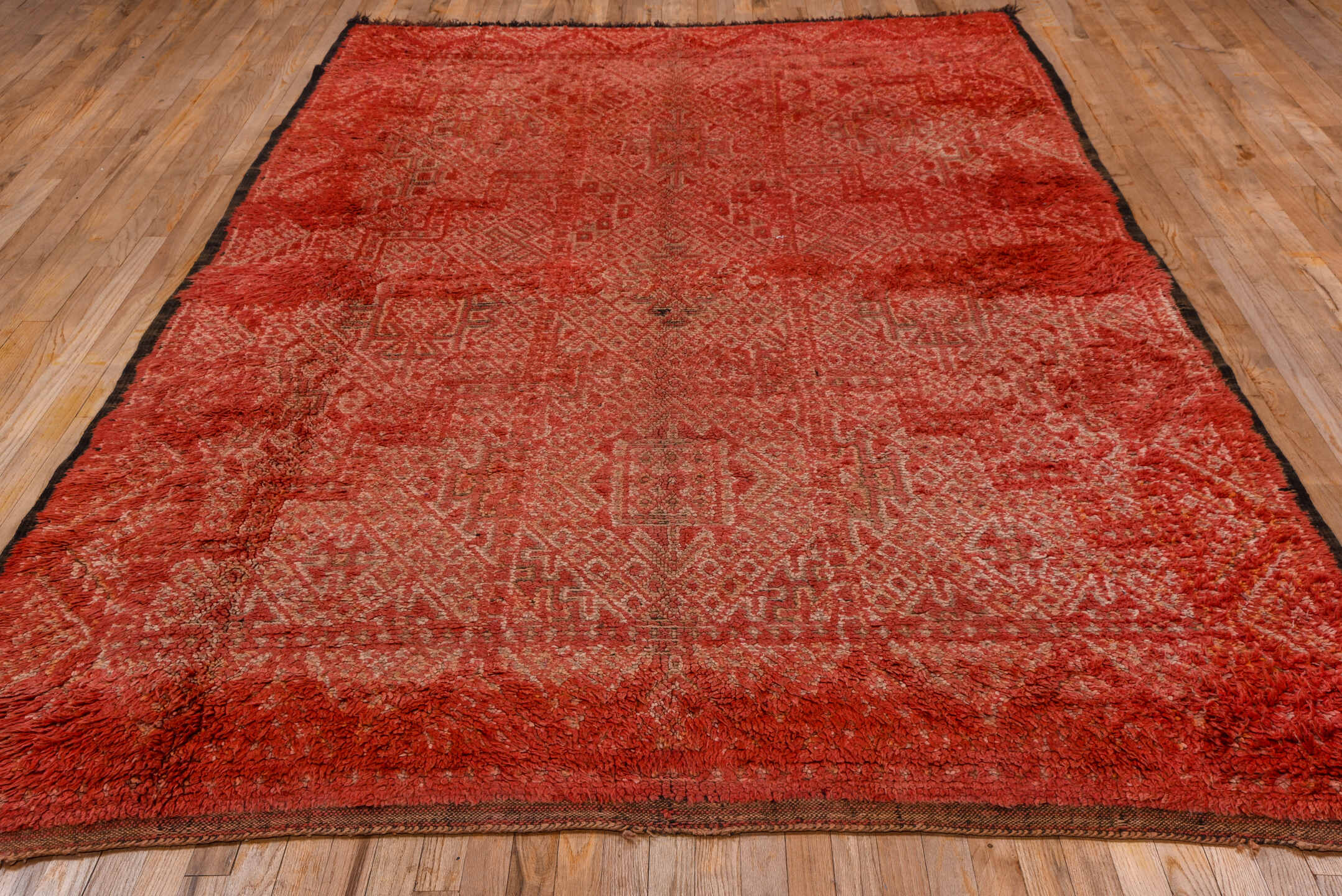 6' x 10' one-of-a-kind handmade vintage Moroccan large size rug. Color palette: brown, pink, red