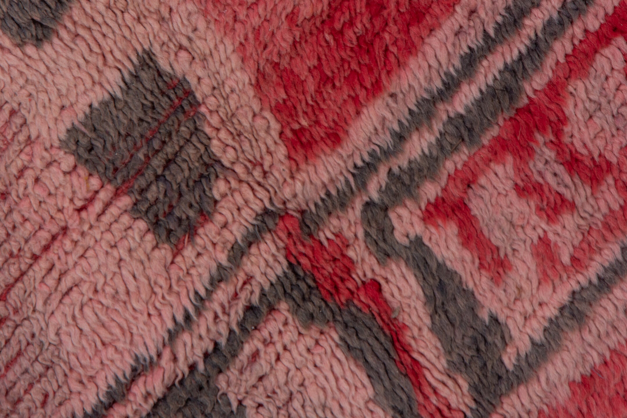5' x 6' one-of-a-kind handmade vintage Moroccan rug. Color palette: rose, crimson, charcoal, blush, terra cotta, pink, red